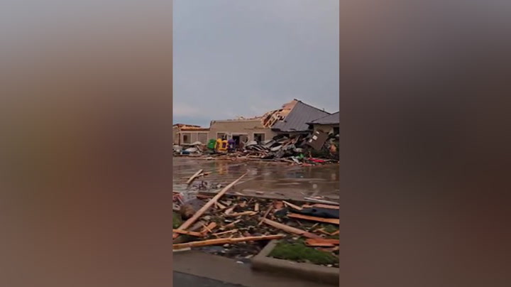 Debris scattered around damaged buildings after tornado hits Texas | News