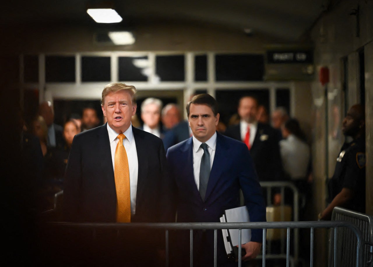 Donald Trump and his attorney Todd Blanche address reporters on May 21.