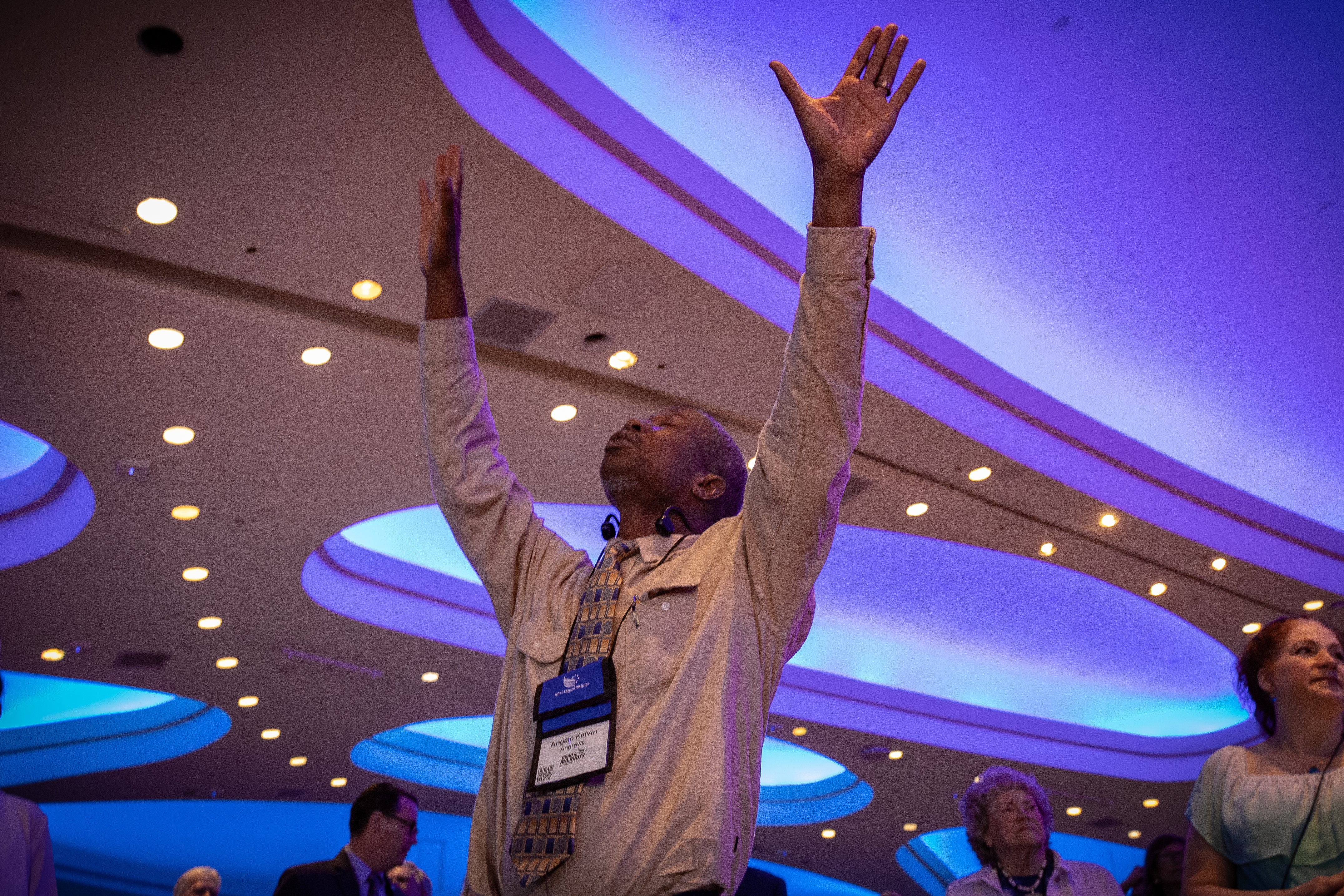 A delegate prays at the Faith and Freedom Coaltion ‘Road to Majority’ conference in Washington, DC on June 22, 2024