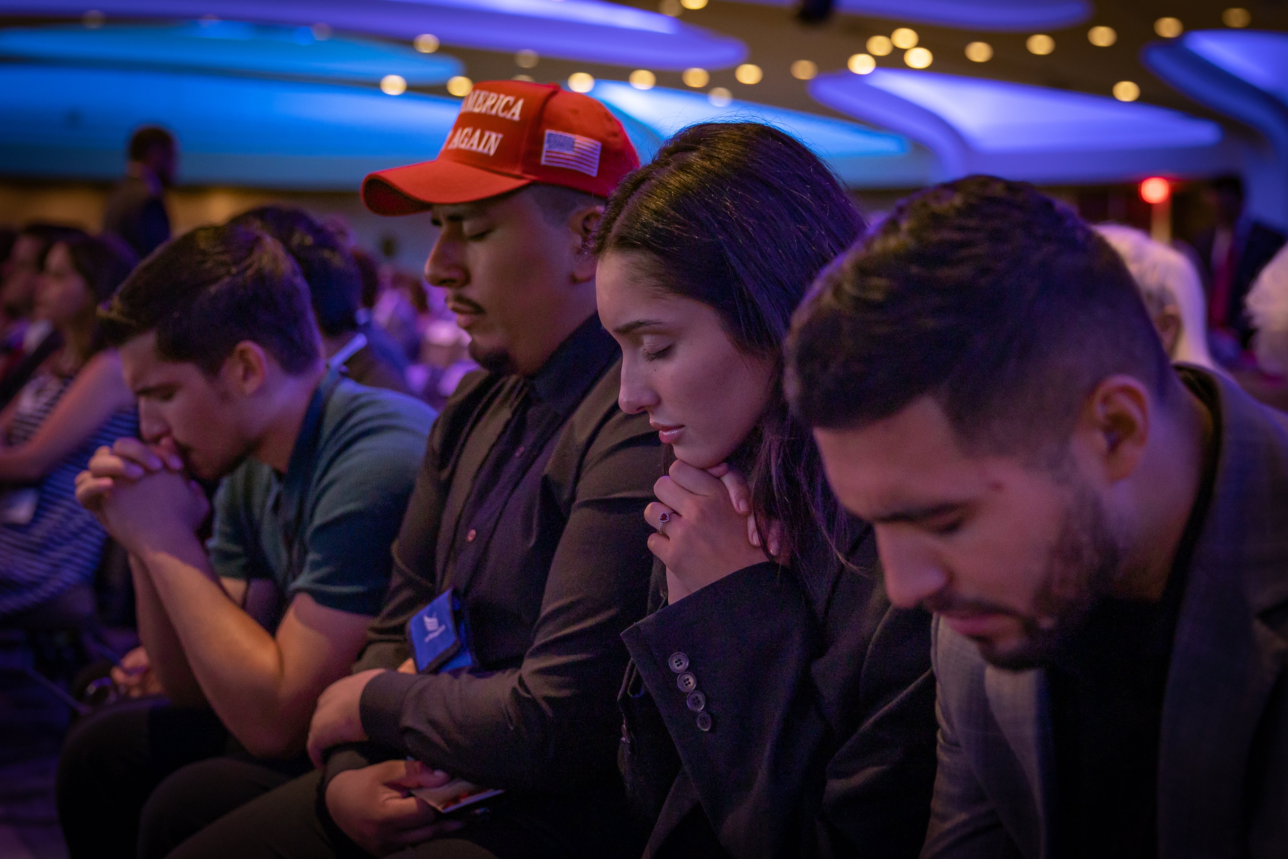 Attendees pray at the Faith and Freedom Coalition ‘Road to Majority’ conference in Washington, DC on June 22, 2024