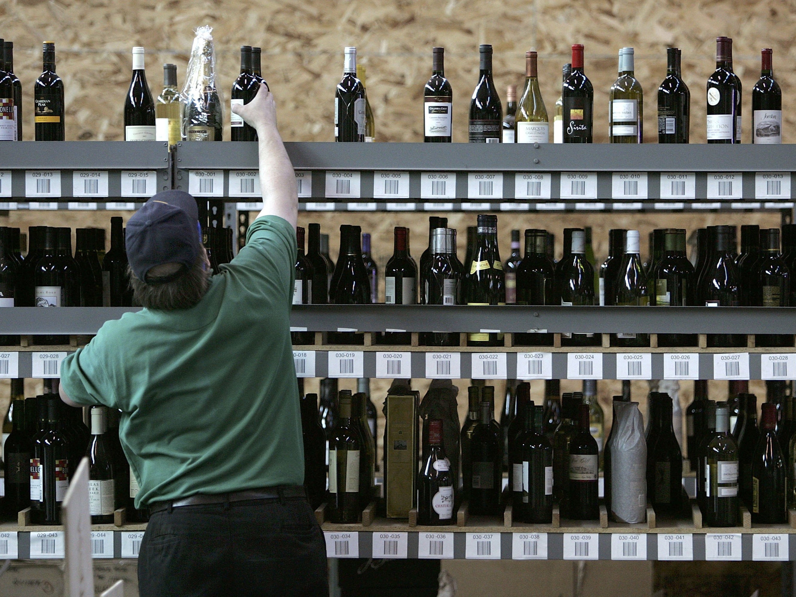 A wine warehouse in Oakland, California. According to a report, the Federal Trade Commission is set to sue the country’s largest alcohol distributor over its pricing practices.