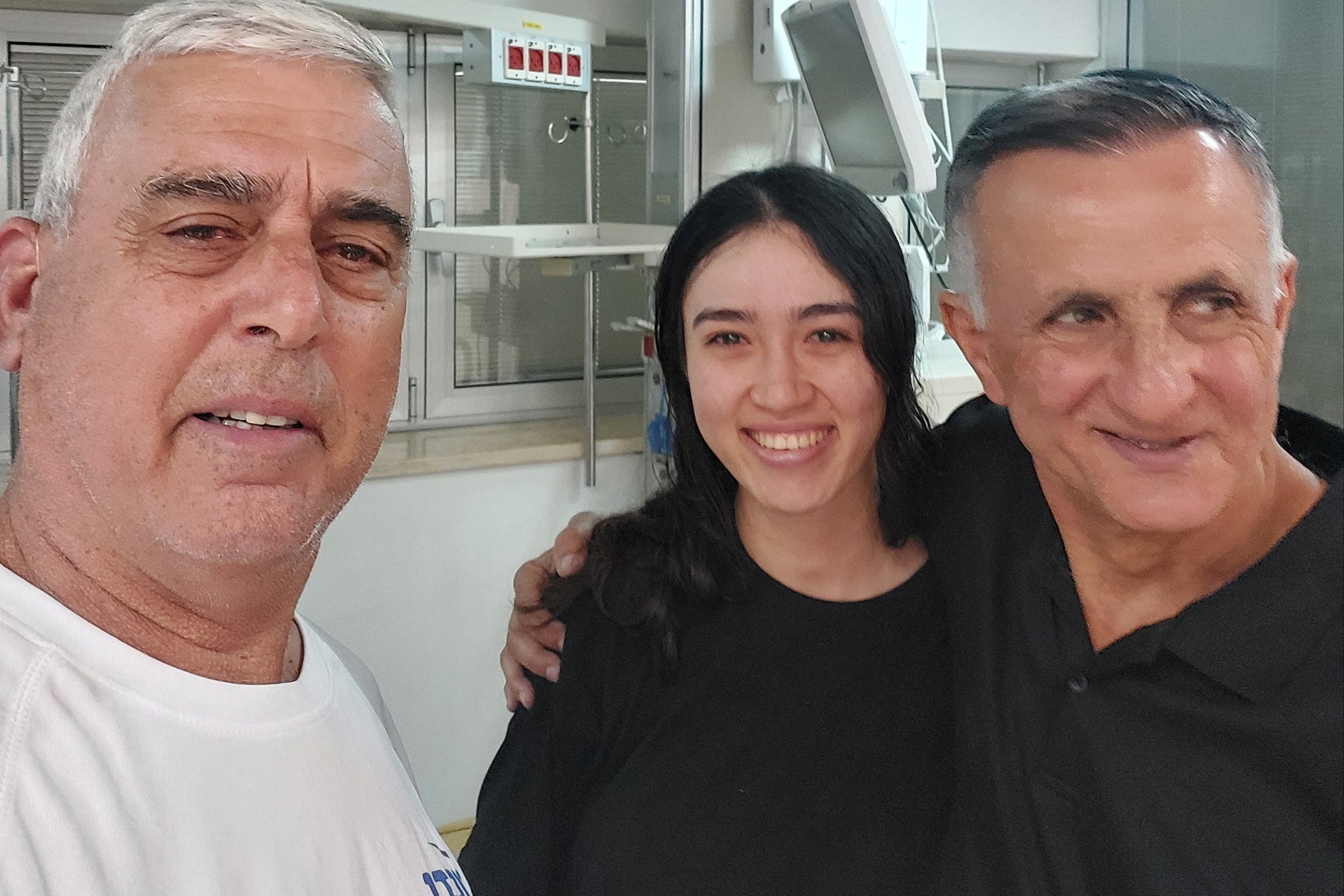 Noa Argamani with her father Yakov and a family friend Nir Givon, in Ramat Gan following her rescue