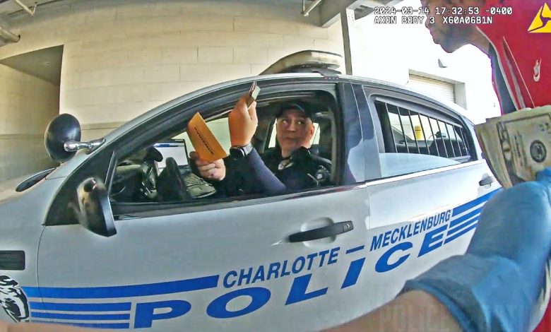 Charlotte Cop Caught on Camera Stealing Cash From a Detainee