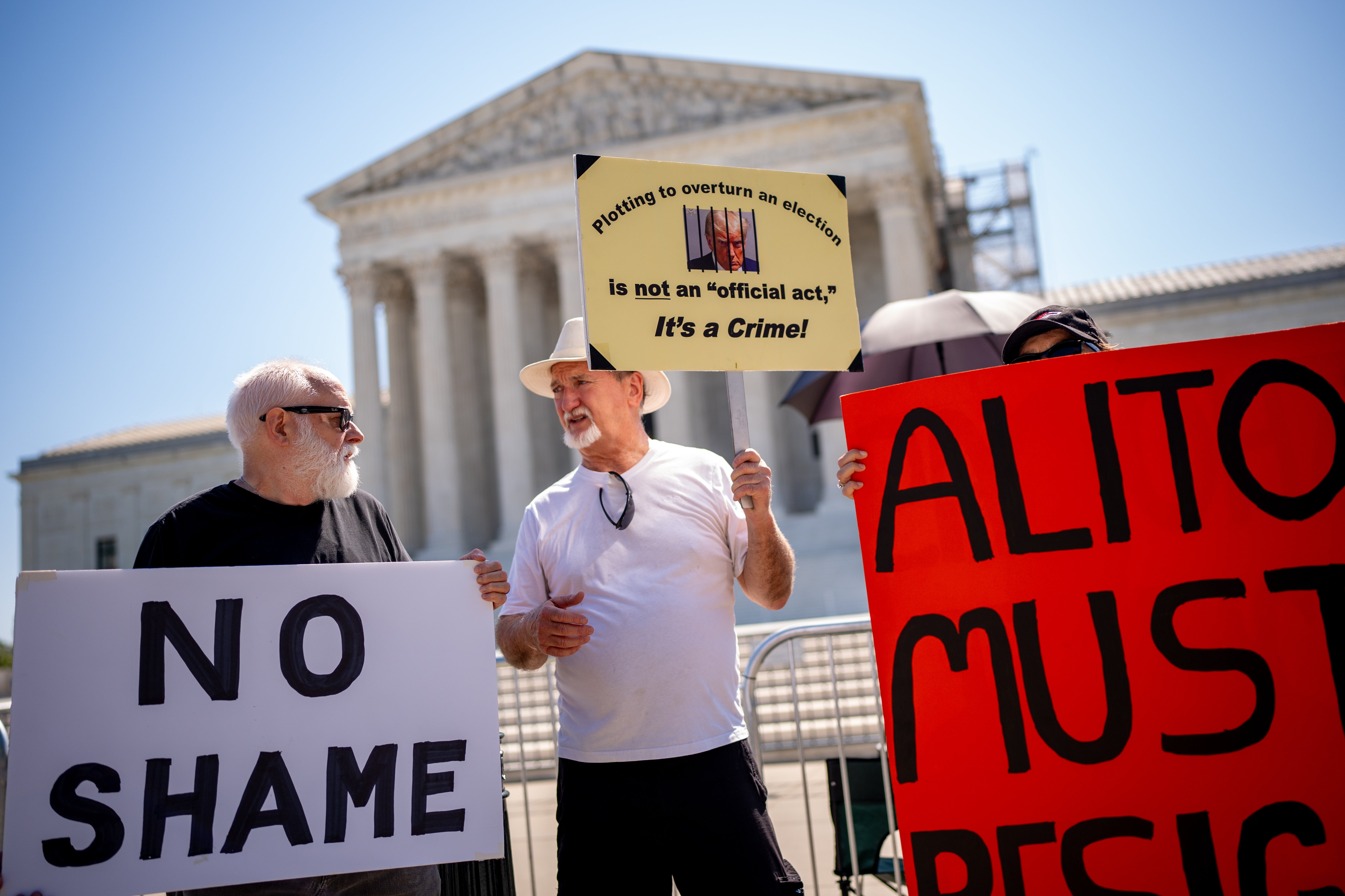 Protesters outside the Supreme Court blast both conservative Justice Samuel Alito, who rejected calls to recuse himself from Trump-related cases, and Trump’s defense that his attempts to overturn election results were “official” acts as president