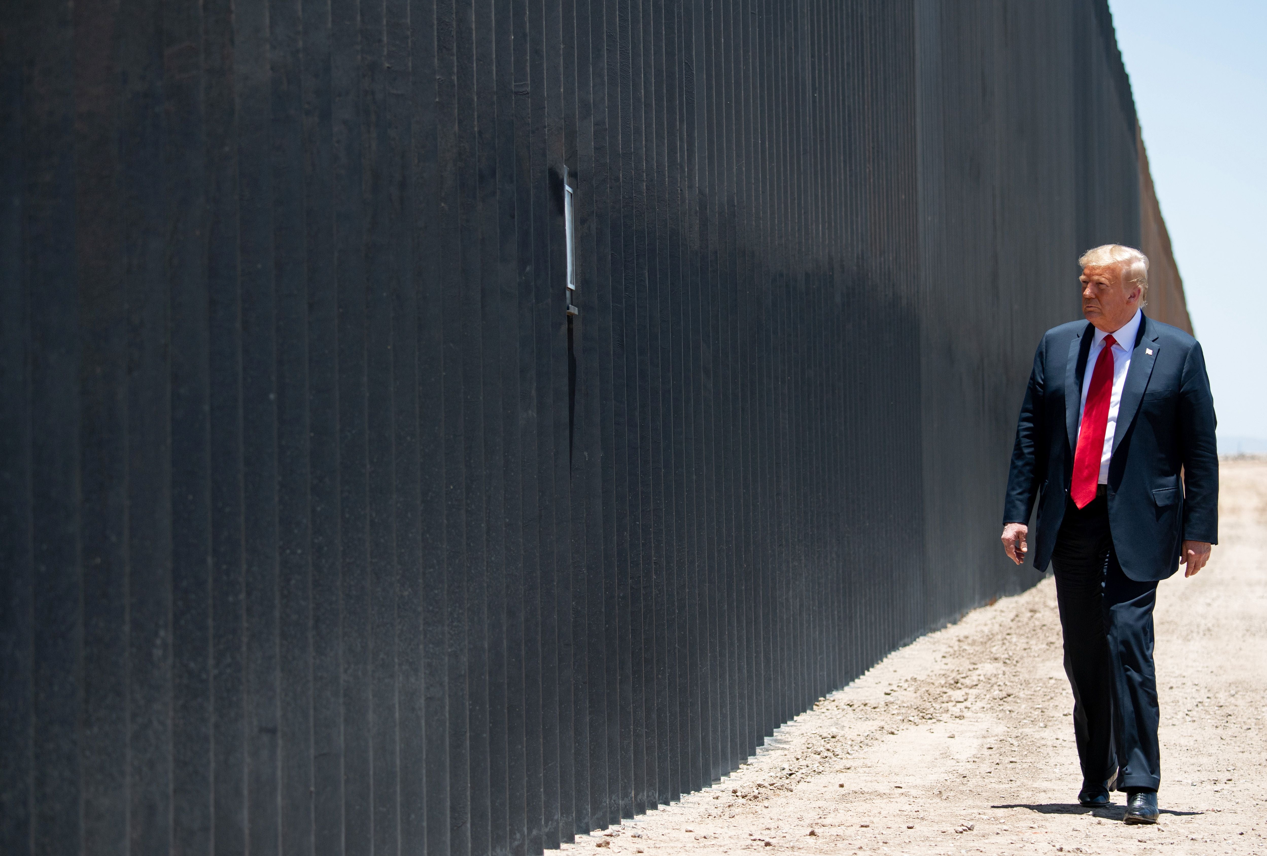 Donald Trump participates in a ceremony commemorating the 200th mile of border wall at the international border with Mexico in San Luis, Arizona, 23 June 2020