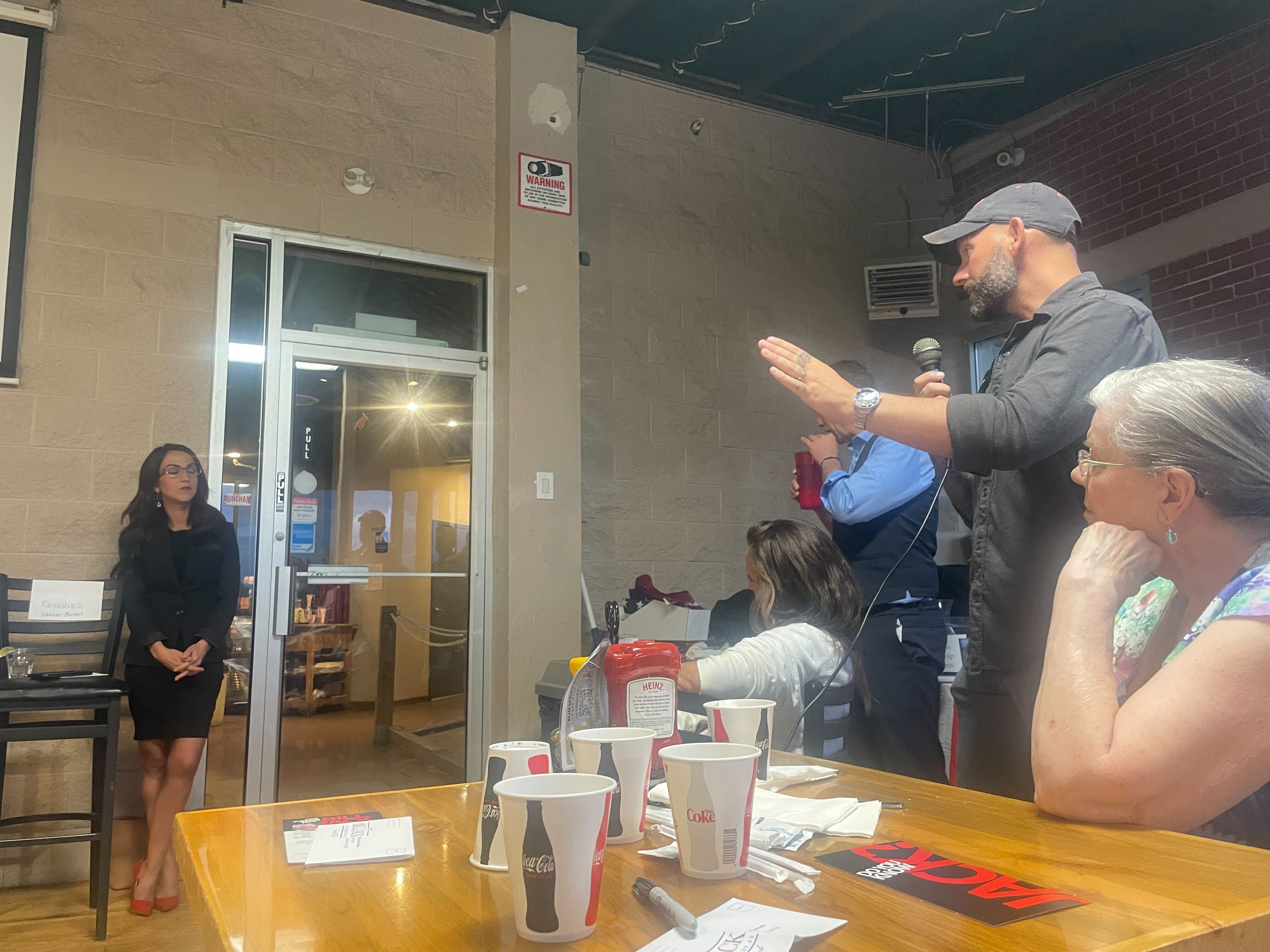 Lauren Boebert facing questions from voters and her fellow candidates in a local campaign event