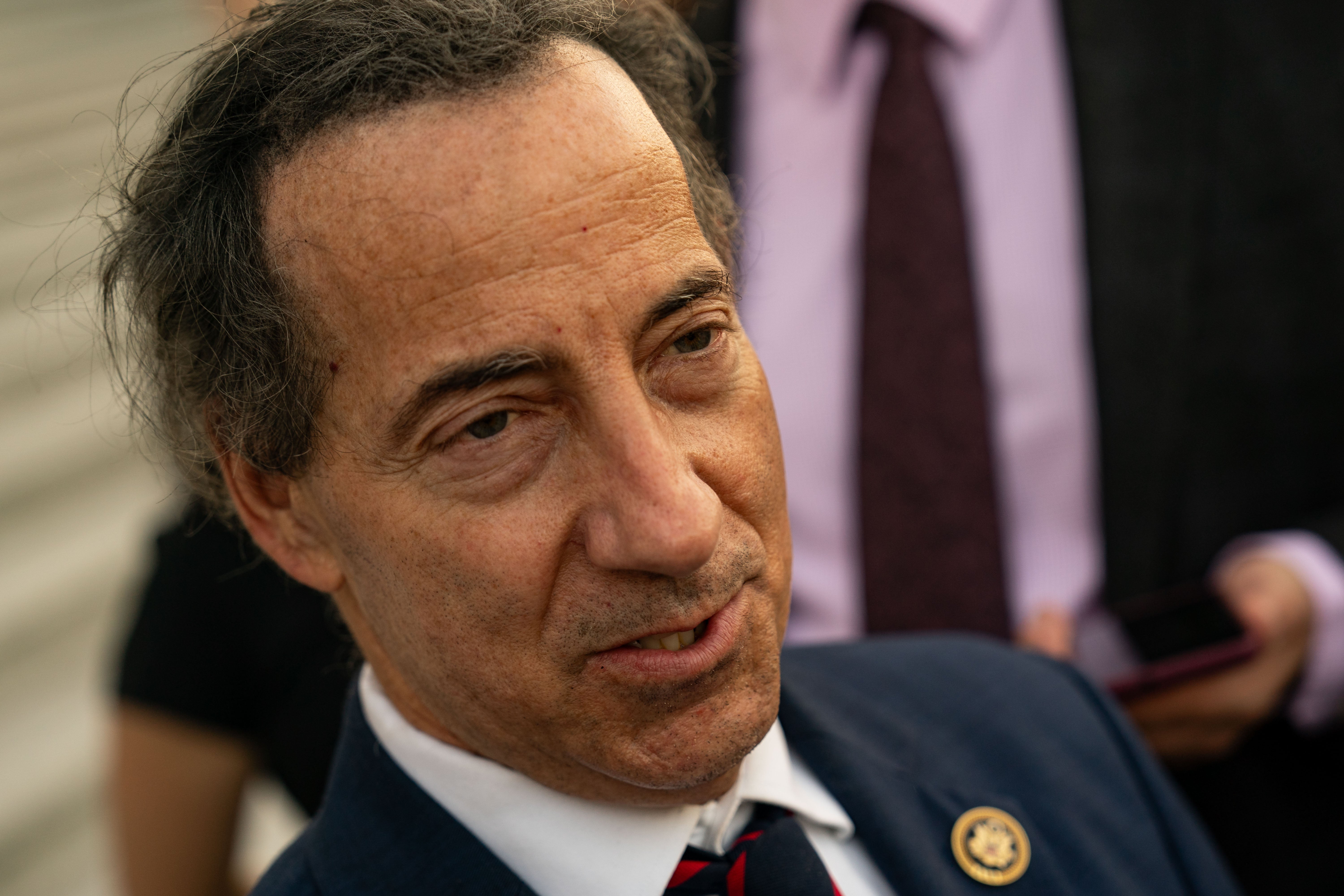 Congressman Jamie Raskin talks to reporters on the steps of the House at the Capitol on July 8. The Maryland Democrat wrote a four-page letter to Joe Biden suggesting that he should end his re-election campaign.