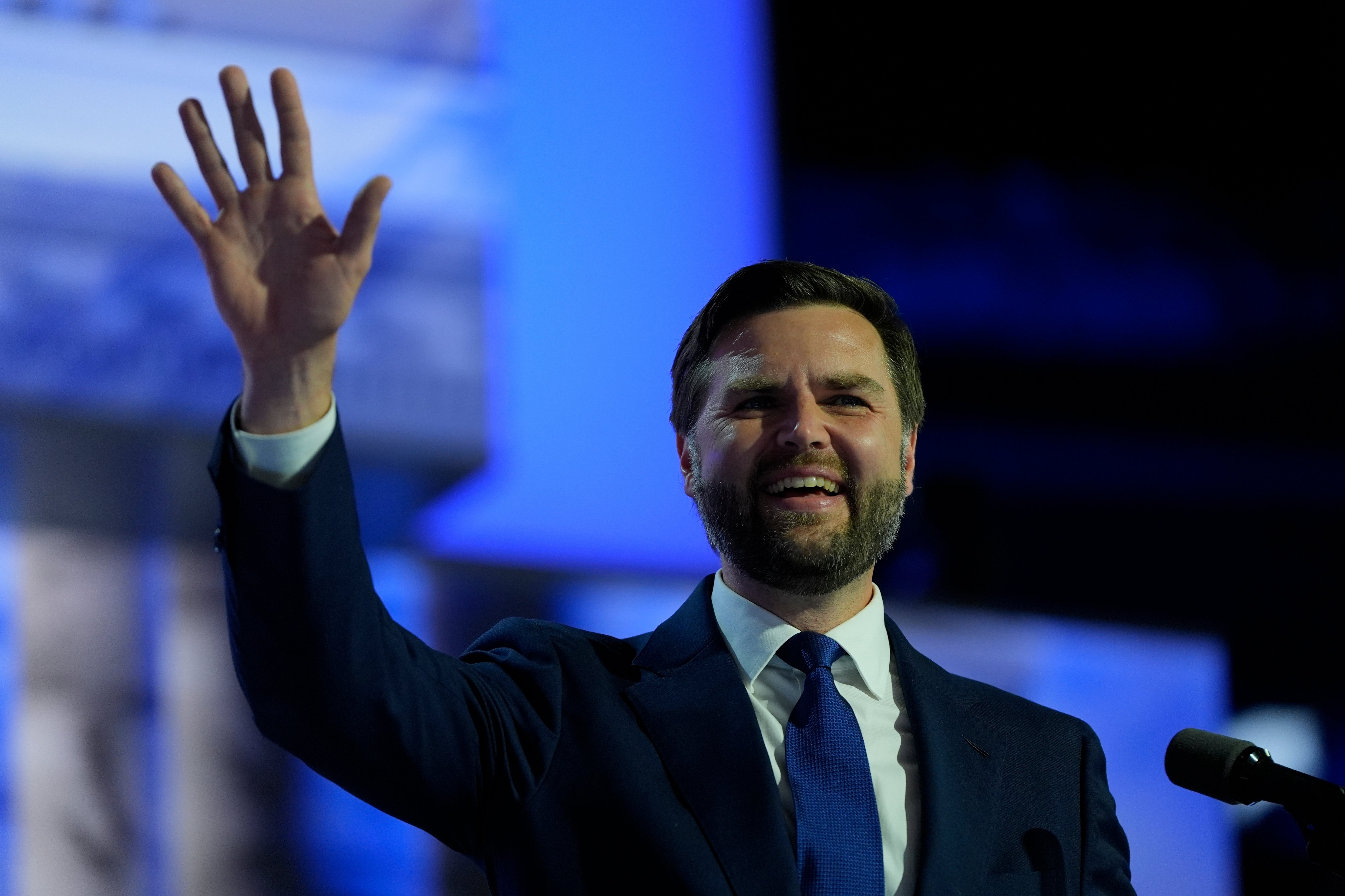 Vice presidential nominee senator JD Vance waves during the Republican National Convention onWednesday, 17 July 2024, in Milwaukee