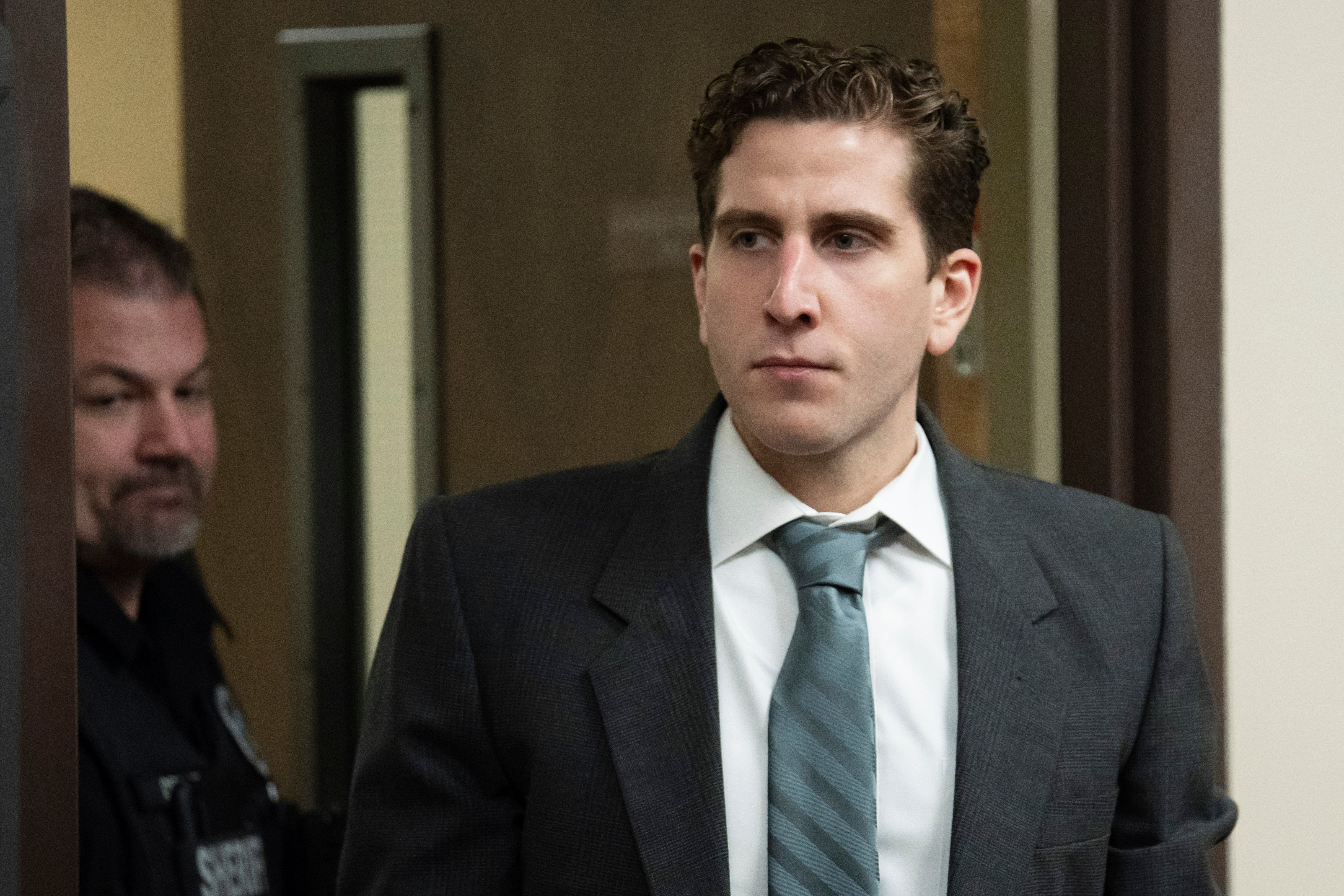 Bryan Kohberger is escorted into a courtroom to appear at a hearing in Latah County District Court in September 2023