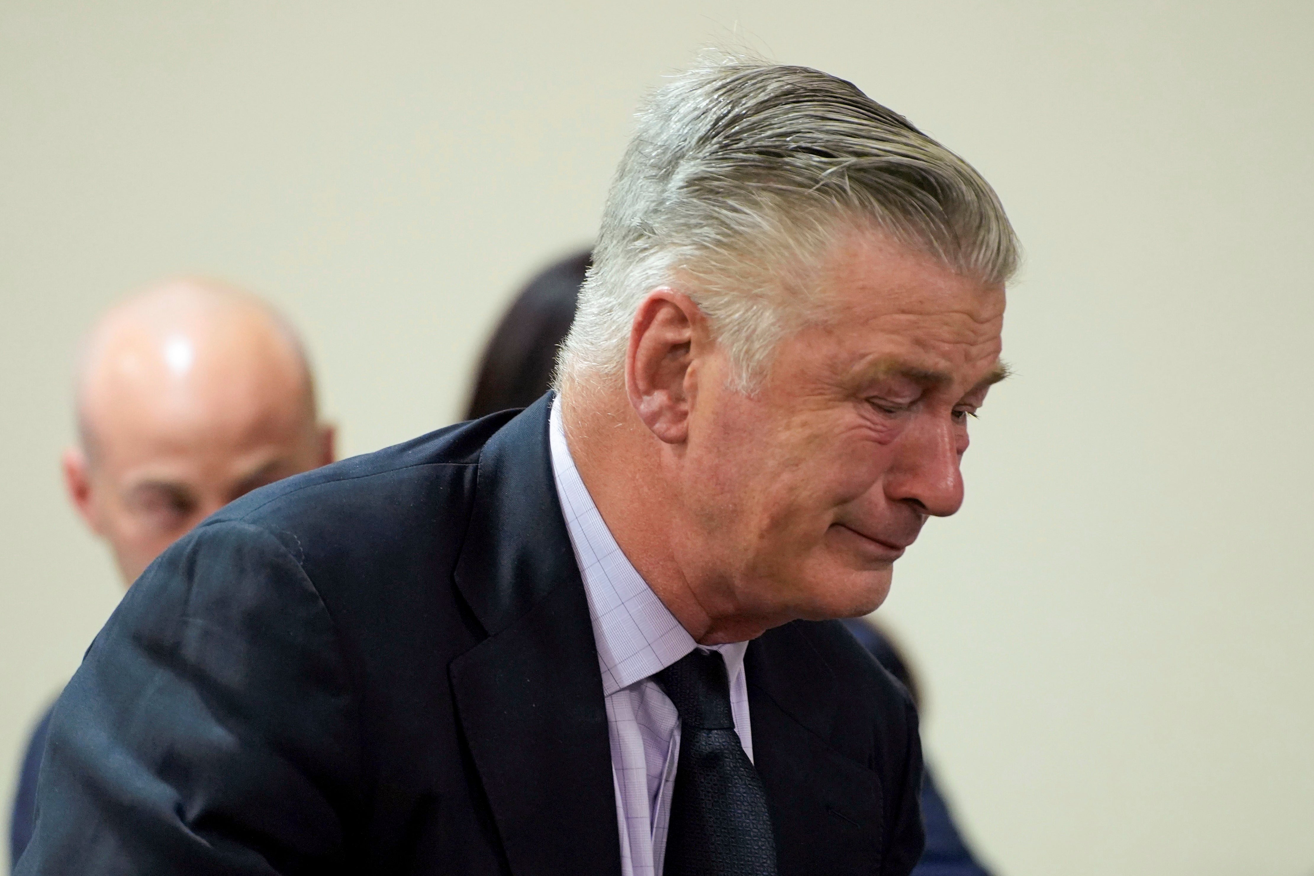 Actor Alec Baldwin reacts during his trial for involuntary manslaughter for the 2021 fatal shooting of cinematographer Halyna Hutchins during filming of the Western movie ‘Rust’