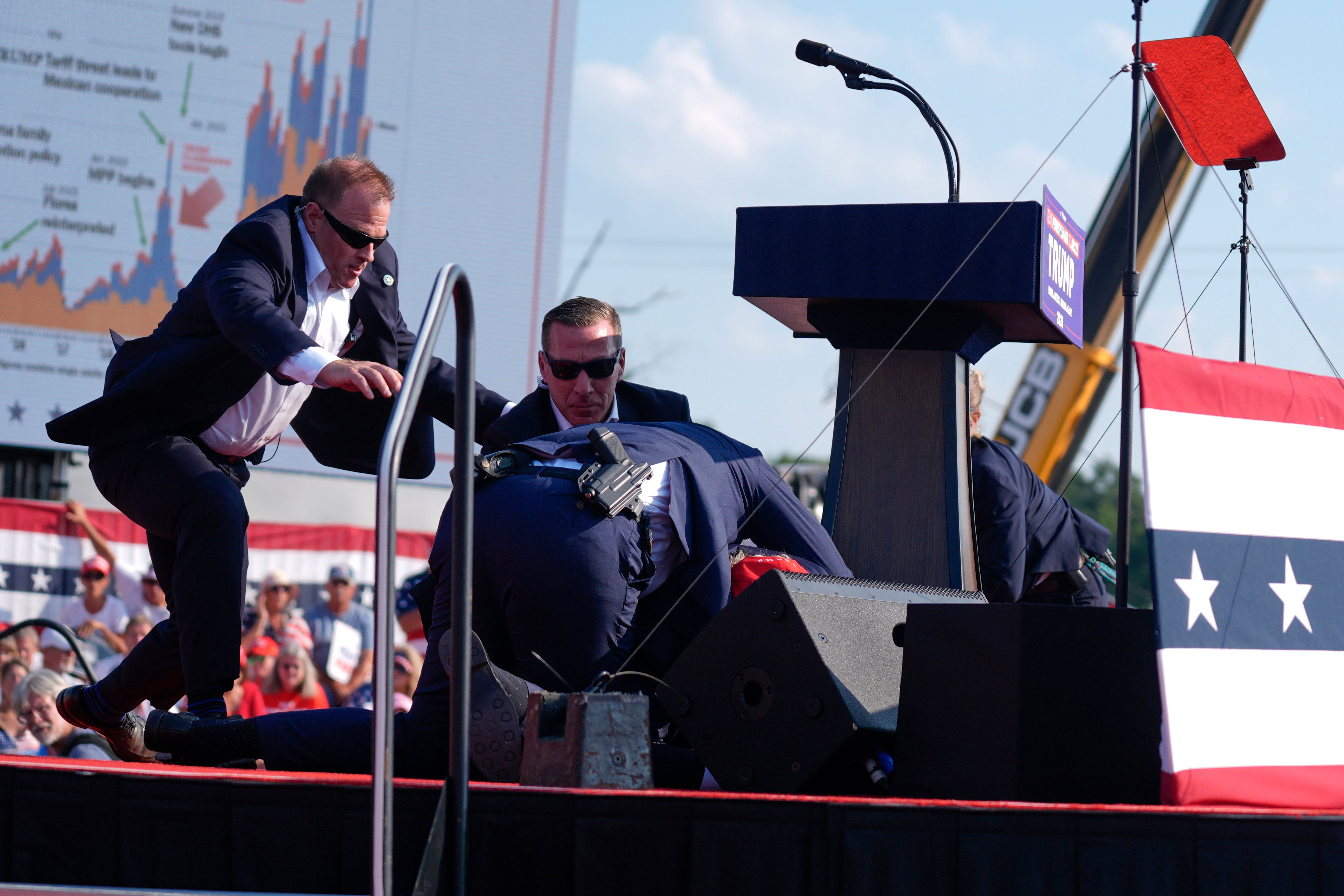 Secret Service surround Trump following shooting. Law enforcement and congressional investigations are underway into potential lapses in the former president’s security detail