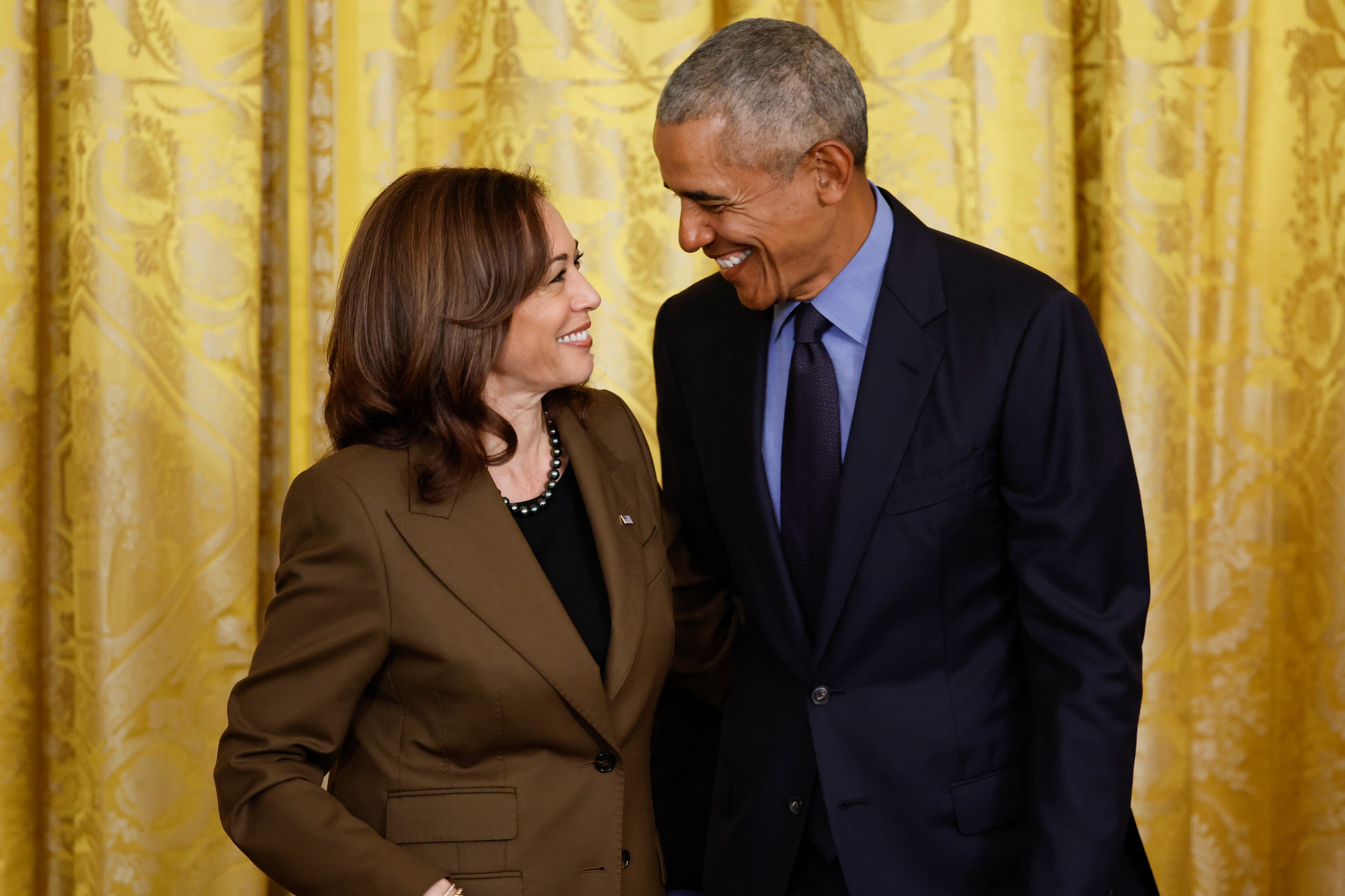 (L-R) Vice president Kamala Harris and former president Barack Obama attend an event to mark the 2010 passage of the Affordable Care Act in the East Room of the White House on 5 April 2022 in Washington, DC