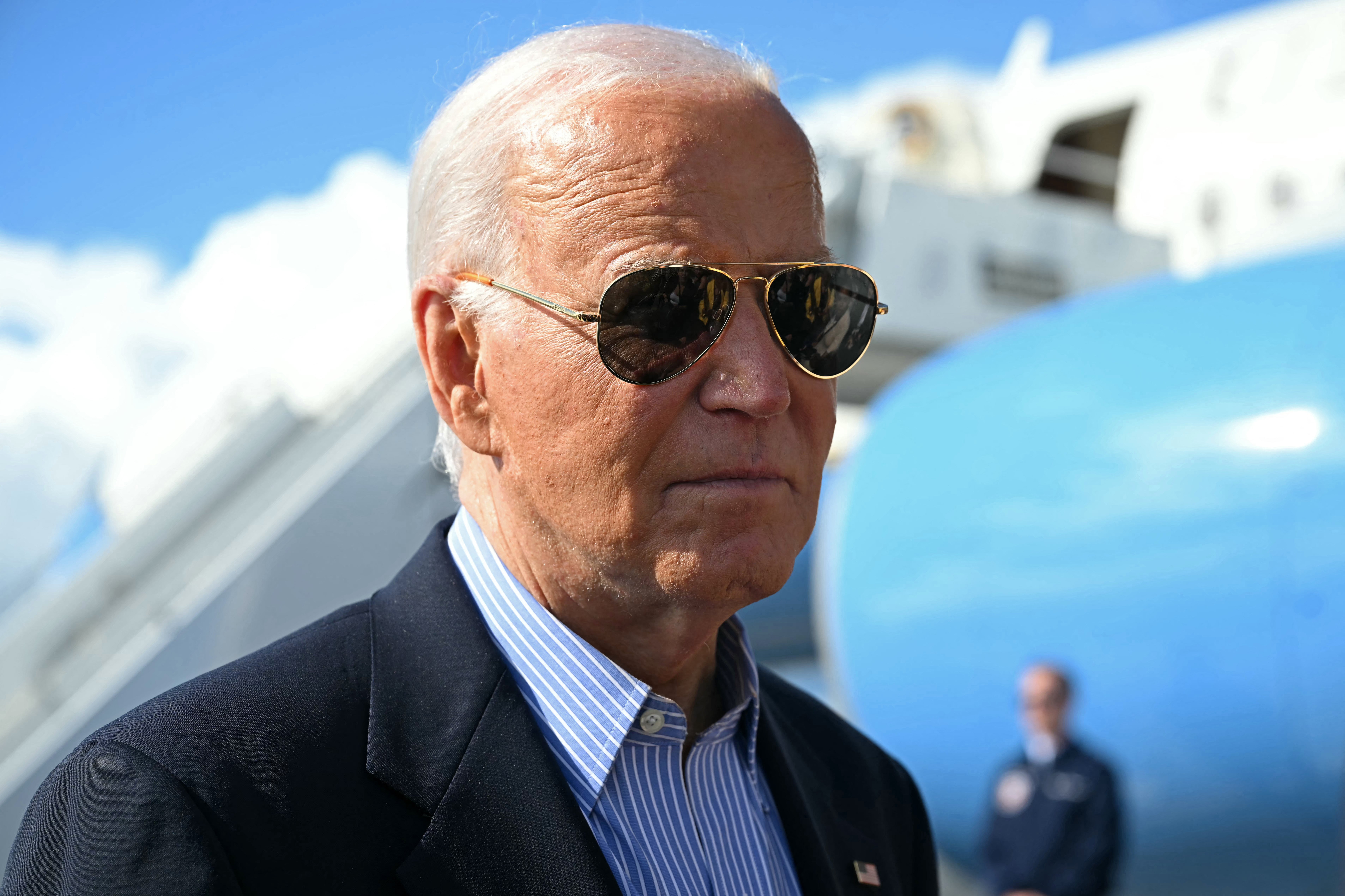 Joe Biden speaks with the press before boarding Air Force One prior to departure from Dane County Regional Airport in Madison, Wisconsin, July 5, 2024