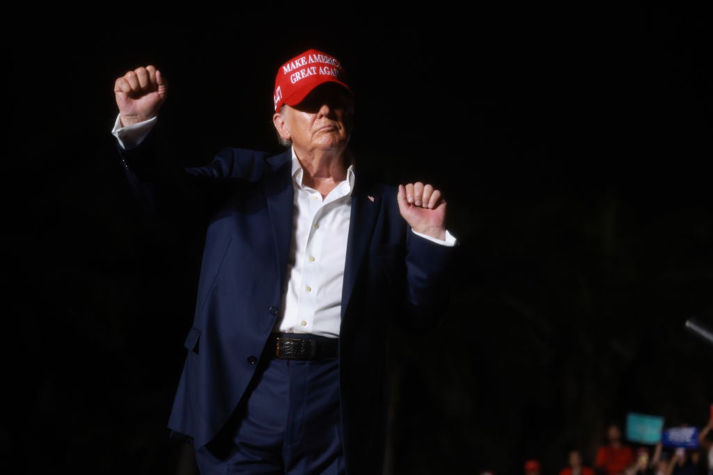 Donald Trump dances onstage during his July 9, 2024 campaign rally at his golf resort in Miami, Florida