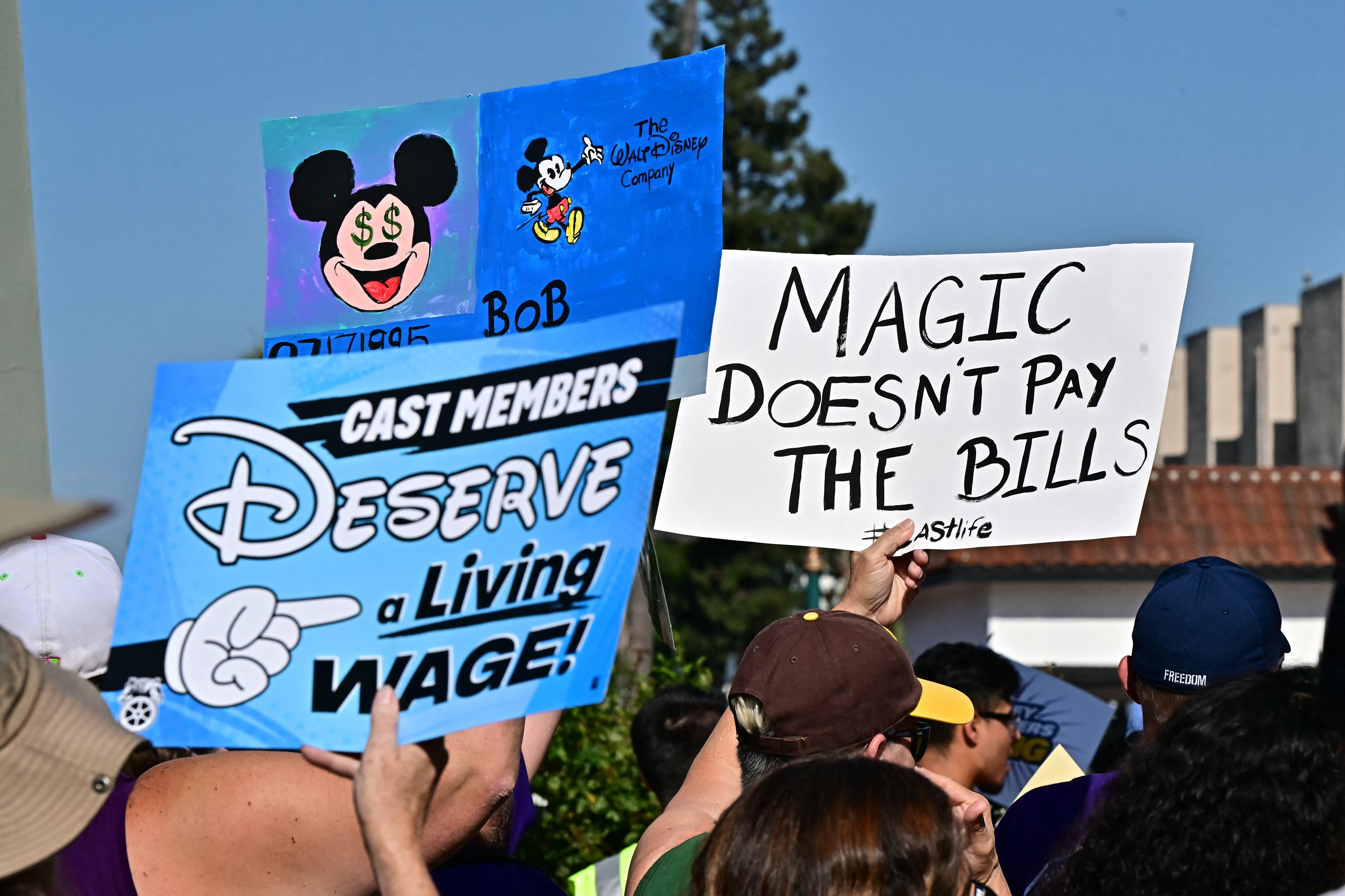 Disney employees rally outside the main entrance of Disneyland Resort in Anaheim, California, ahead of a planned strike authorization vote