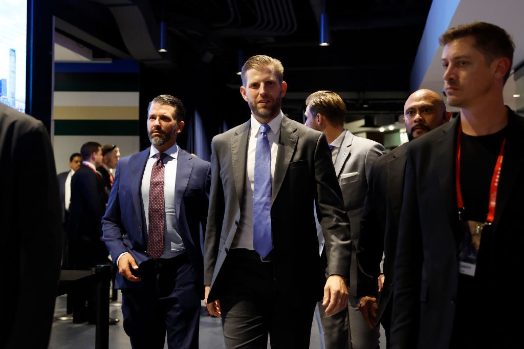 Eric Trump, flanked by brother Donald Trump Jr on the left, attends the 2024 RNC convention in Milwaukee where anti-abortion Republicans are livid about changes to the GOP platform.