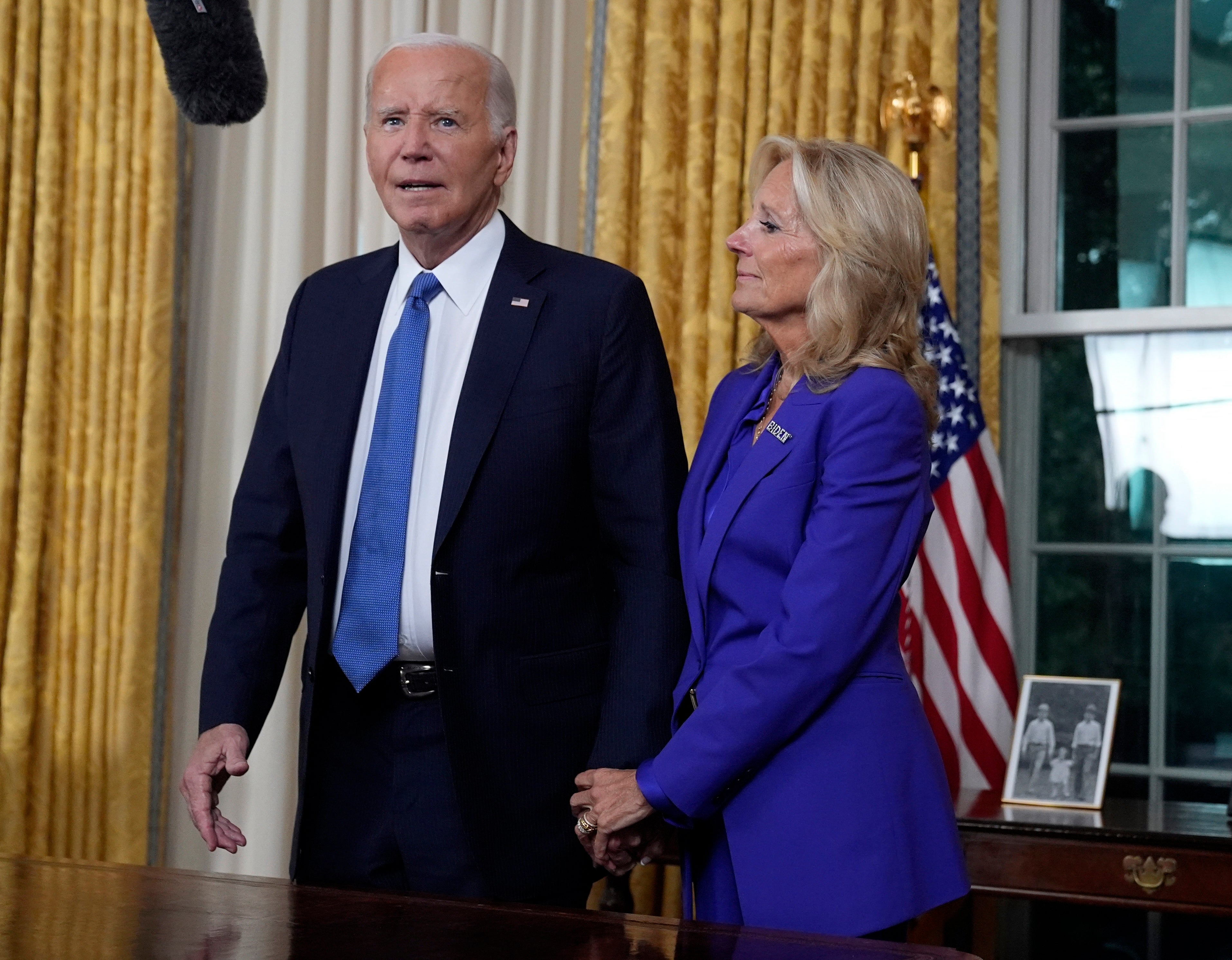 A picture of President Joe Biden’s children when they were young was perched on the table behind him