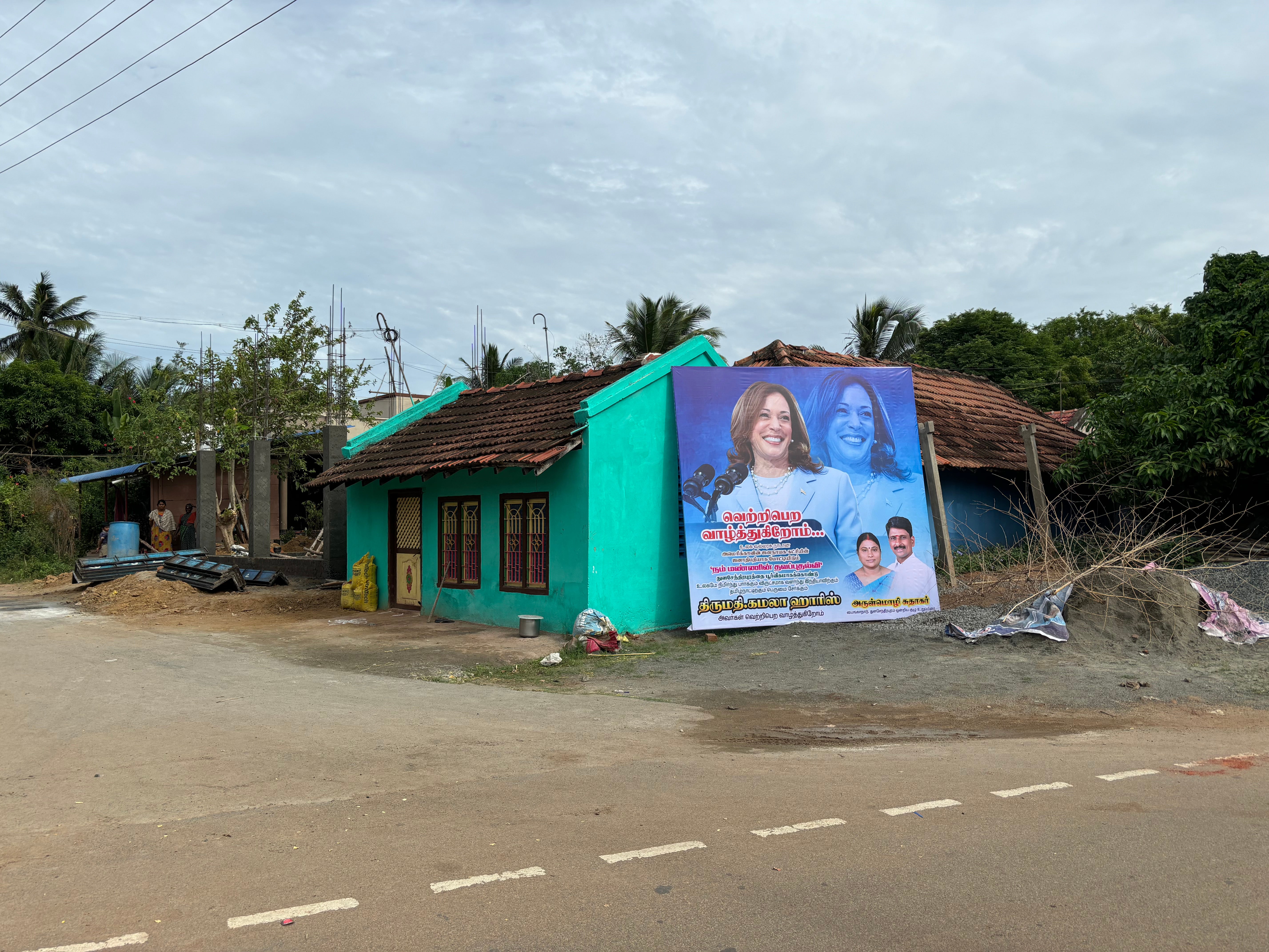 Banner wishing for Kamala Harris’ success placed against a house in Thulasendrapuram village in Tamil Nadu