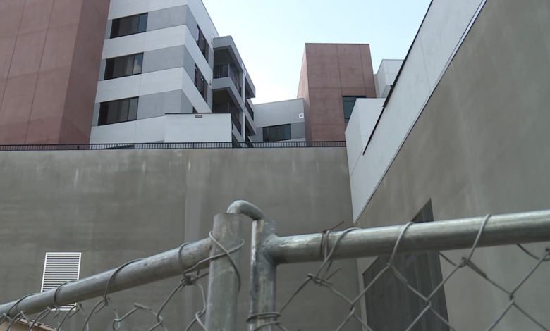 Squatters keep taking over 7-story Vegas-area apartment building that stalled out while under construction