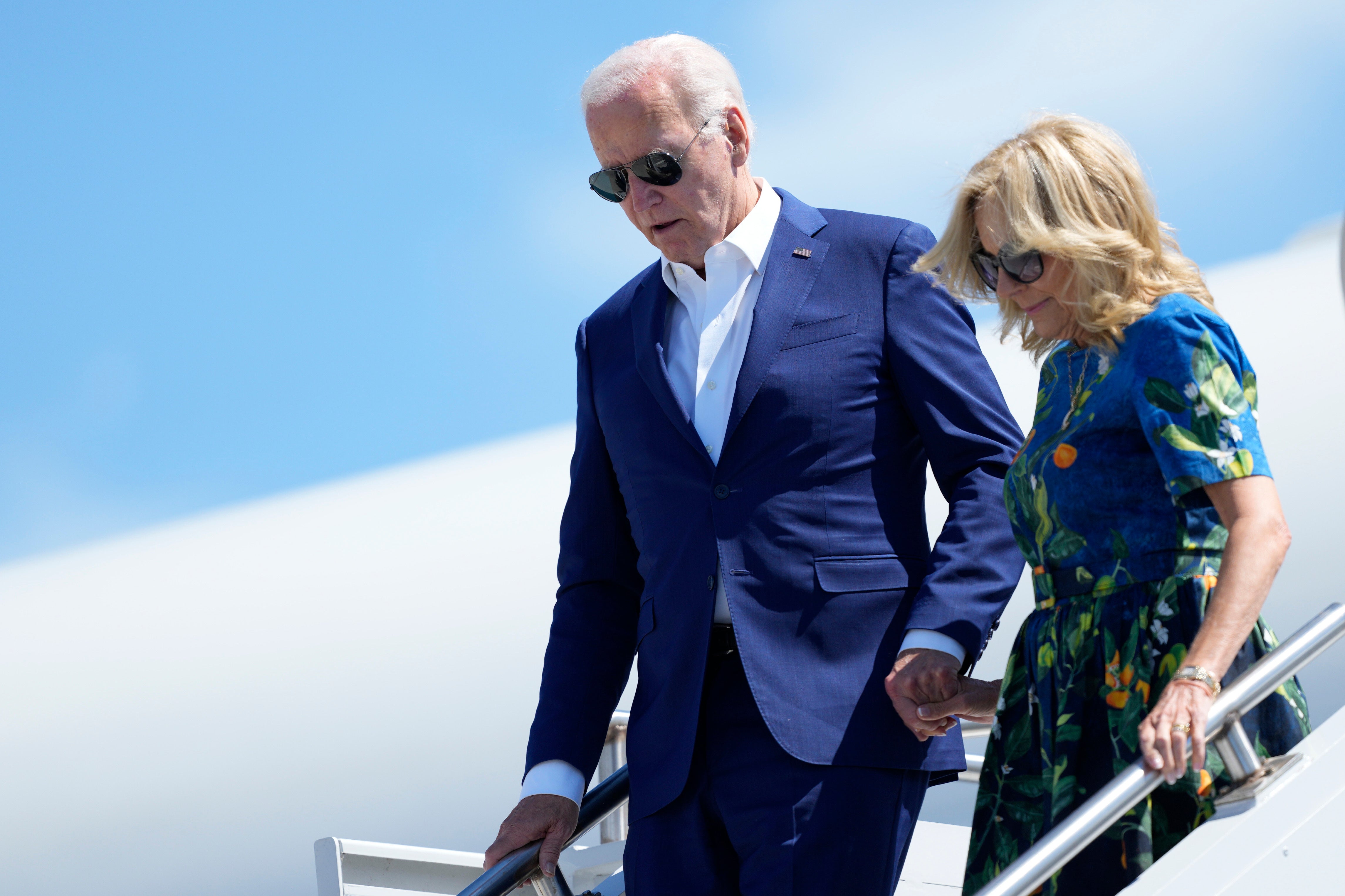 President Joe Biden and first lady Jill Biden disembark Air Force One at Harrisburg International Airport on Sunday