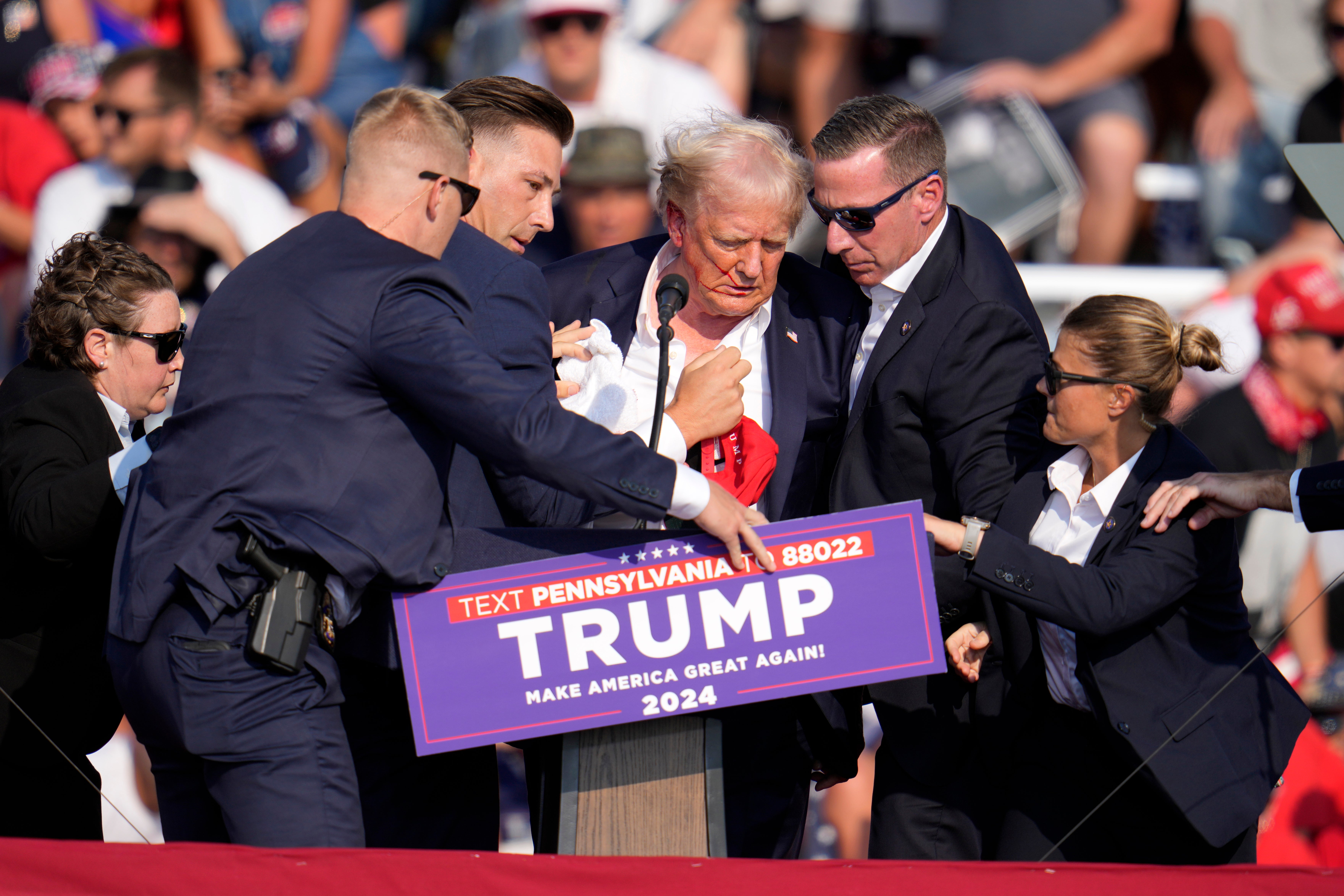 Secret Service rush to get Donald Trump off stage