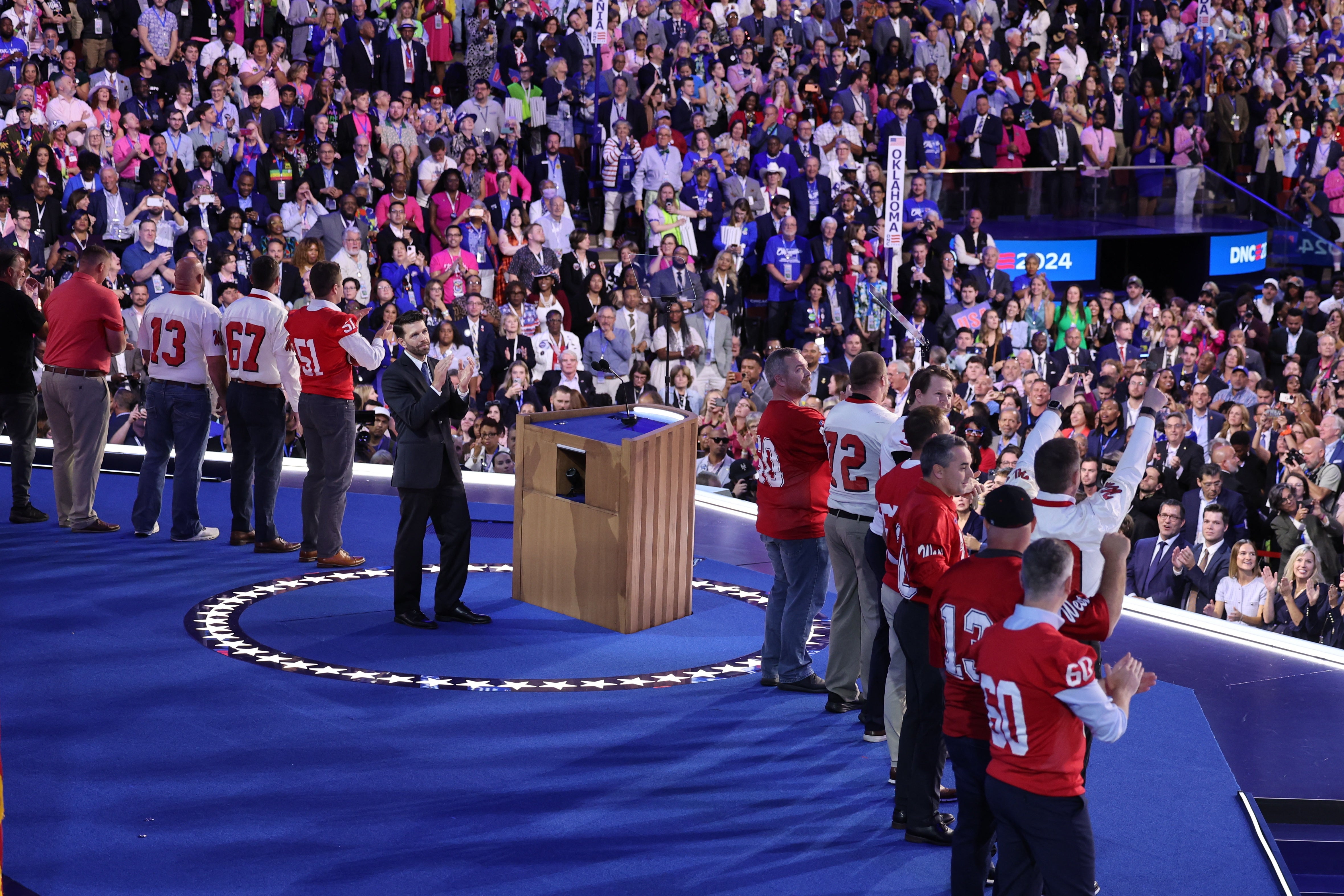 Tim Walz’s former football team introduced him to the stage at the Democratic National Convention on Wednesday