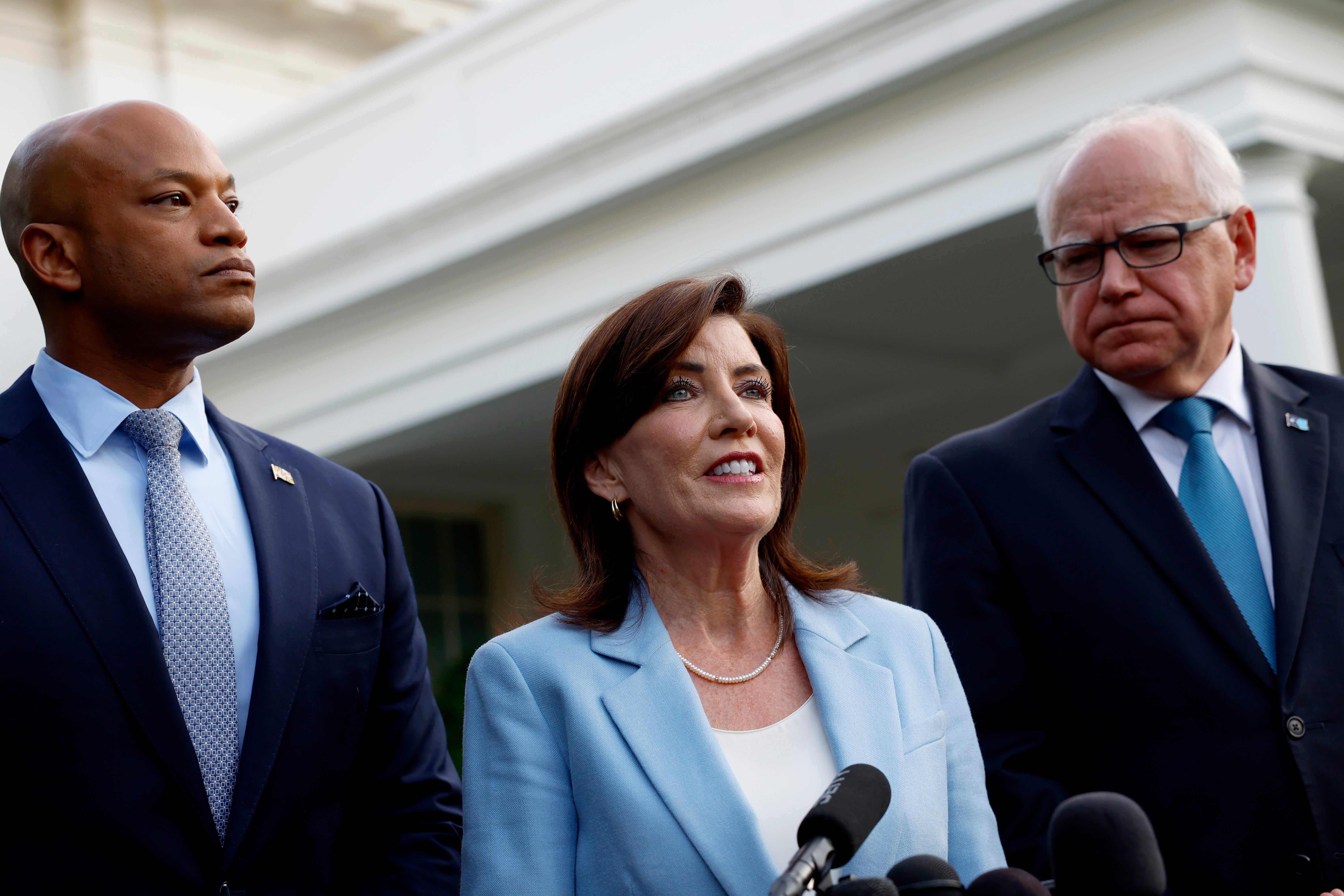 Just days before Joe Biden dropped out, Walz (right) stood behind him. Now Walz is a favorite to be Kamala Harris’s running mate