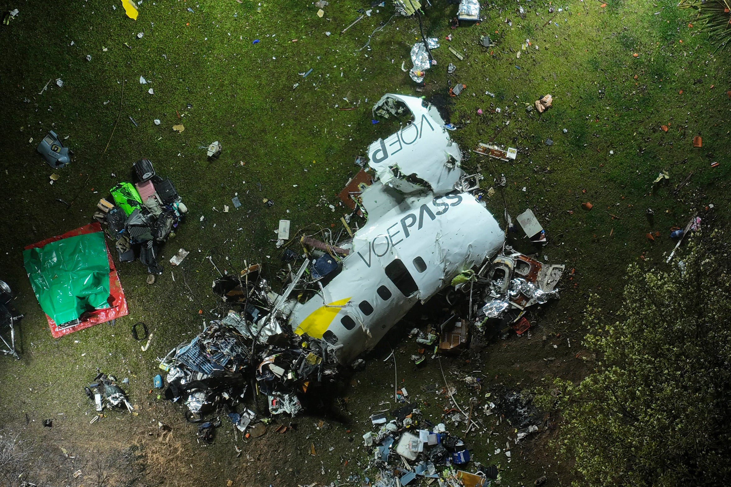 The debris of a plane is seen at the site of the crash in Vinhedo