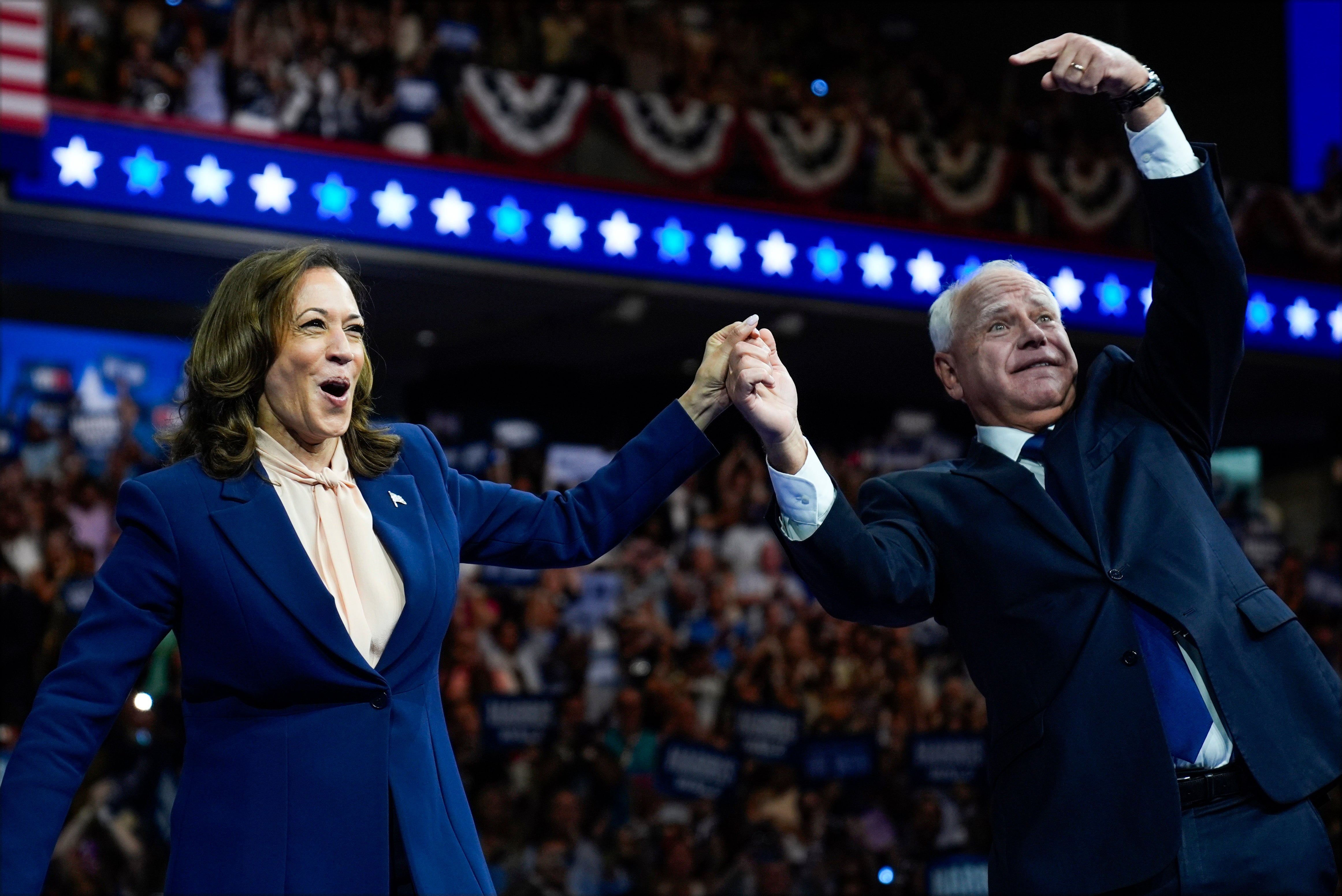 Democratic presidential nominee Vice President Kamala Harris and her running mate Minnesota Gov. Tim Walz speak at a campaign rally in Philadelphia on Aug. 6