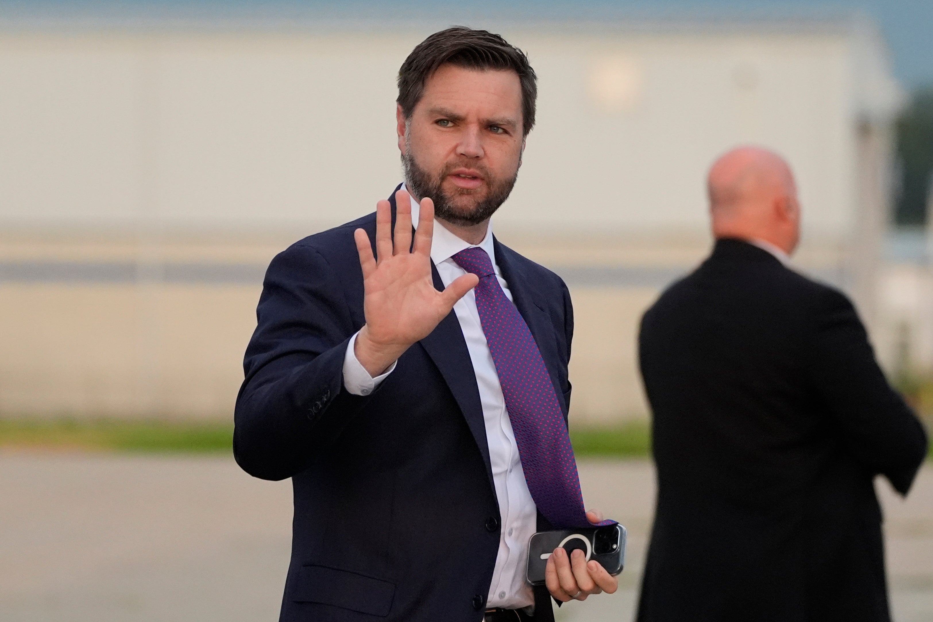 Republican vice presidential nominee Sen. JD Vance, R-Ohio, arrives to board his plane at Cincinnati/Northern Kentucky International Airport, Wednesday, Aug. 7, 2024, in Hebron, Kentucky