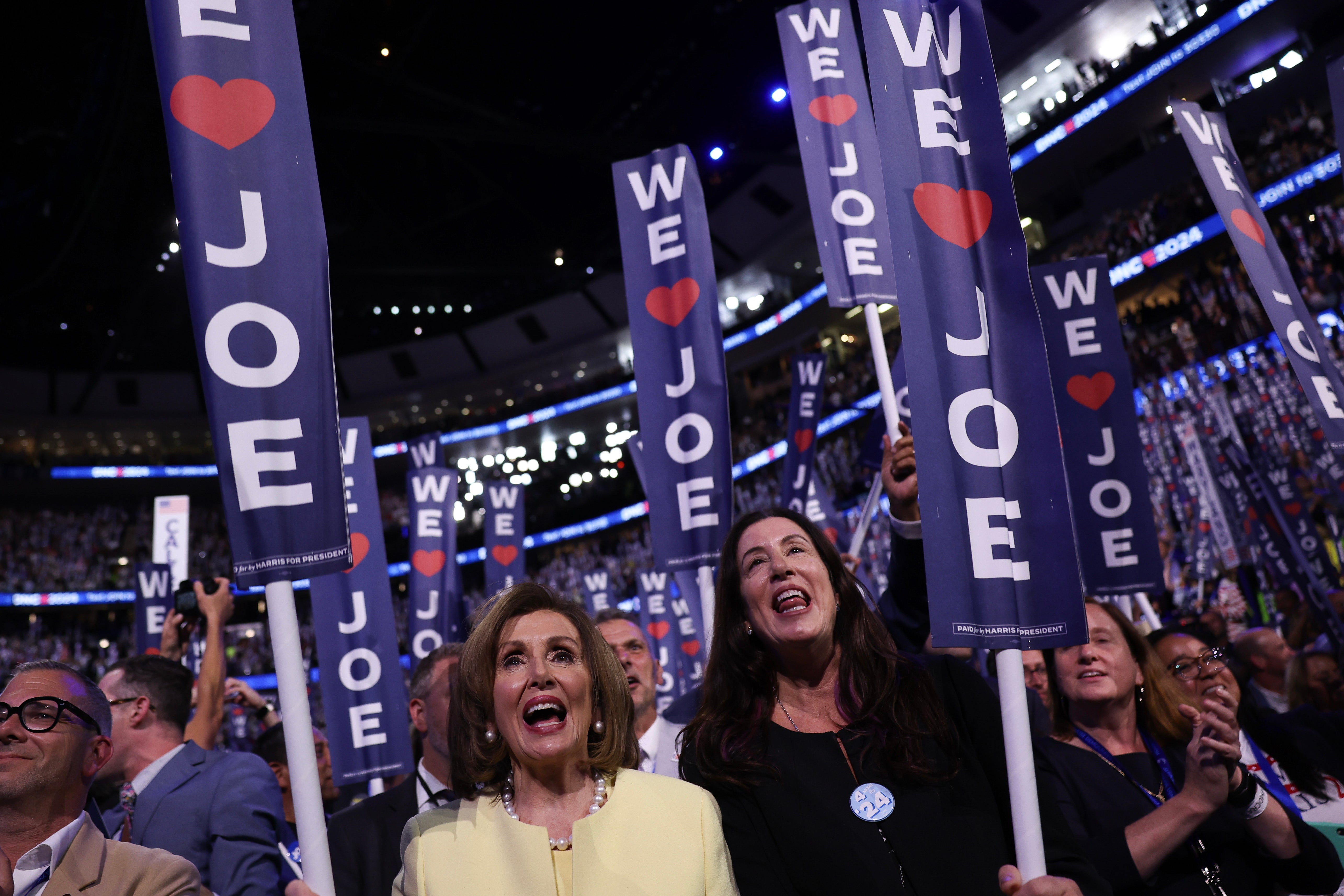 Speaker Emerita Nancy Pelosi held up a Joe Biden sign during the first day of the Democratic National Convention at the United Center on August 19, 2024 in Chicago, Illinois. After years of being a pariah, most Democrats and Republicans consider her the greatest speaker in history.