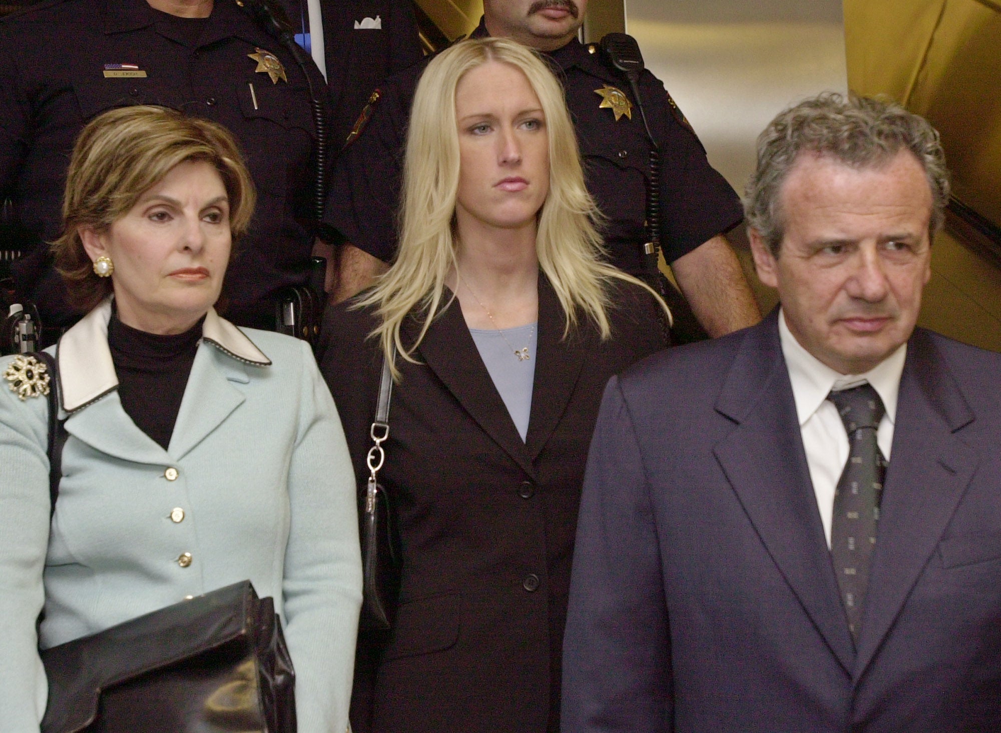 Amber Frey (center) leaves court after testifying in Peterson’s murder trial