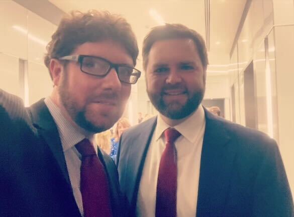 Cullen Tiernan, a former Marine Corps combat correspondent who deployed with JD Vance, pictured alongside the Ohio senator and running mate of Donald Trump.