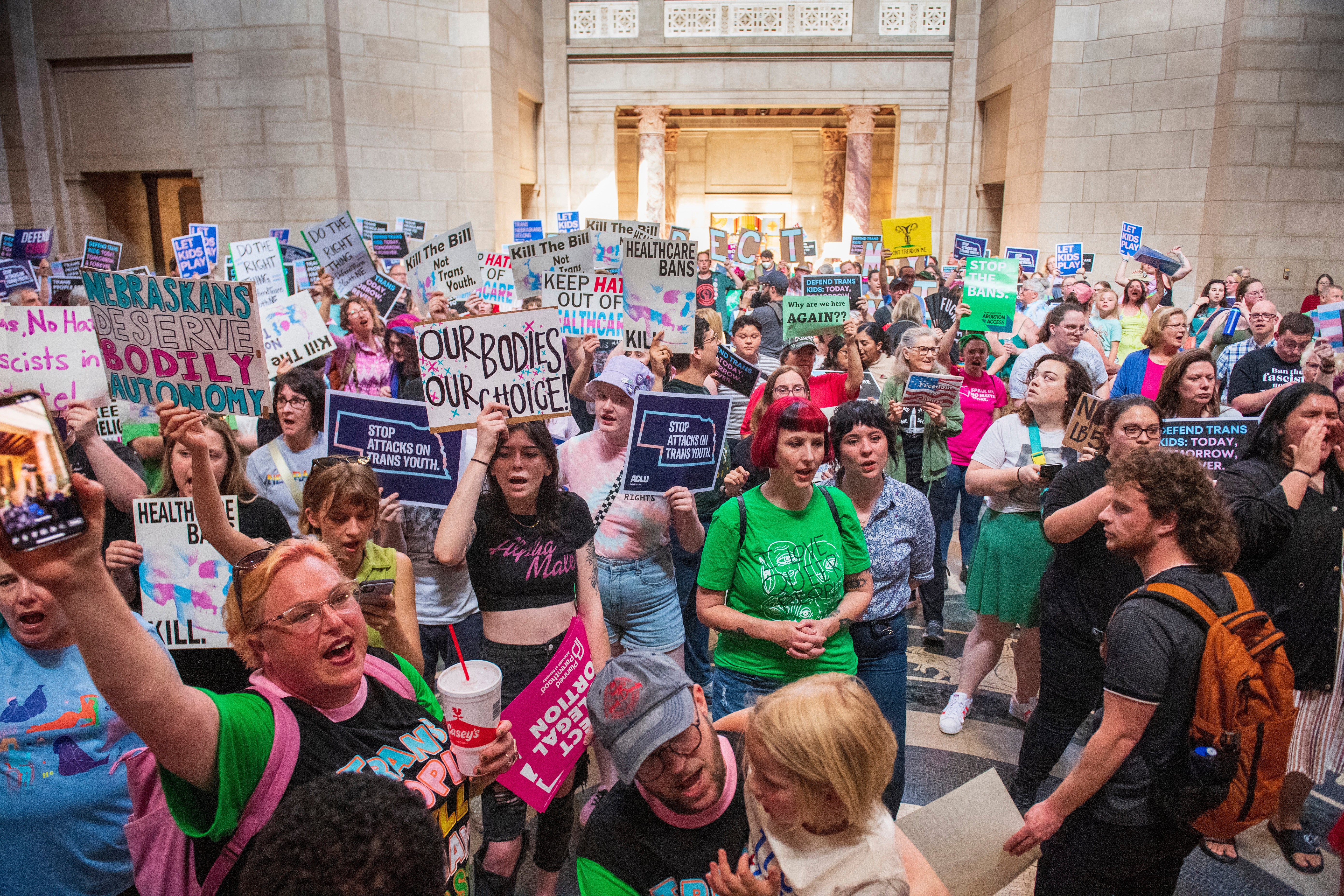 Abortion rights protestors chantedat the Nebraska legislative chamber during a final reading on a bill that combined a 12-week abortion ban with a measure to restrict gender-affirming care for people under 19 in May of 2023