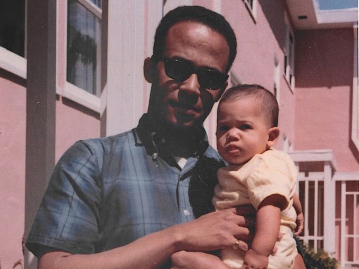 Donald Harris on his way to a doctorate in economics at Berkeley in April 1965 while holding Kamala