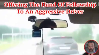 Offering The Hand Of Fellowship To An Aggressive Driver