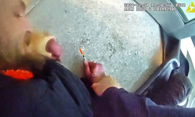 Man Tries to Attack Officer With Needle During Arrest