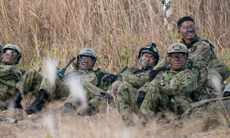 Japans passes record defense budget, while still playing catch-up