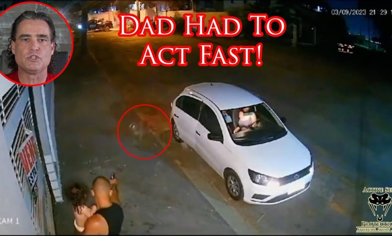 Dad Has Split Second To Protect Himself And His Baby From Charging Dog