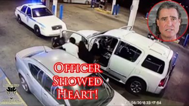 Officer Fights Off Two Armed Attackers