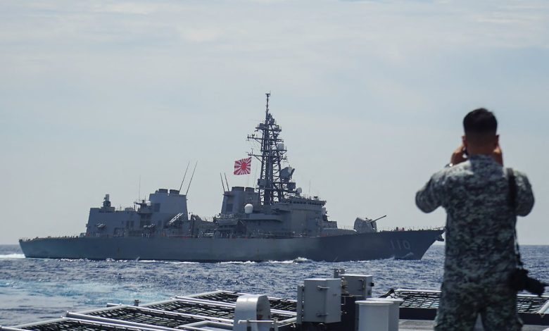 Japan’s Cabinet OKs record defense budget that aims to deter China