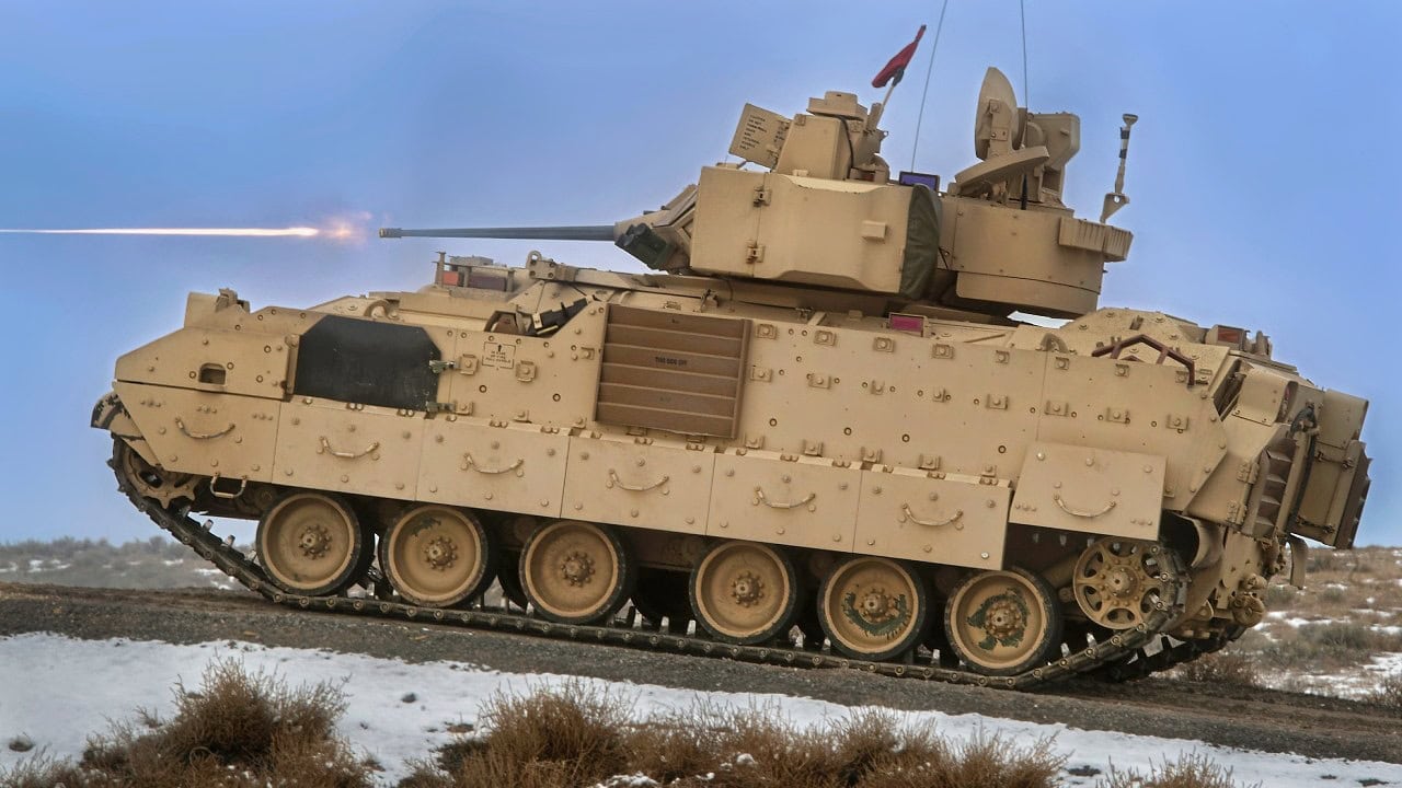 The Bradley Fighting Vehicle cuts loose several rounds from the 25mm main gun on the orchard Combat Training Center Range.