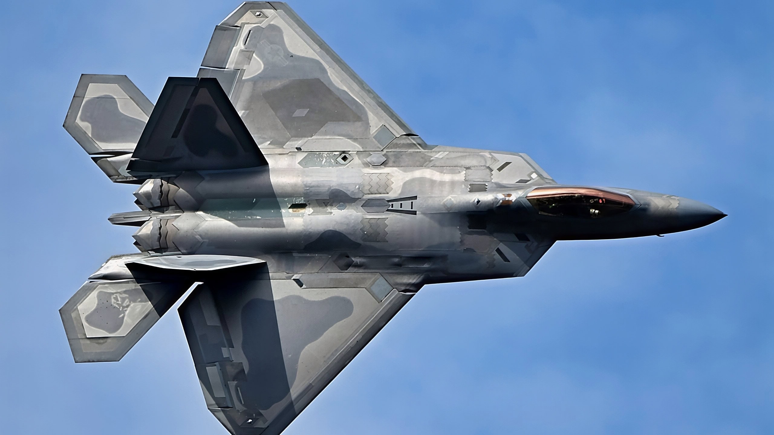 U.S. Air Force Maj. Josh ‘Cabo’ Gunderson, F-22 Raptor Demonstration Team pilot, flies during the Lockheed Martin Sace and Air Show in Sanford, Florida, Nov. 1, 2020. The F-22 possesses a sophisticated sensor suite allowing the pilot to track, identify, shoot and kill air-to-air threats before being detected. (U.S. Air Force photo by Staff Sgt. Sergio A. Gamboa)