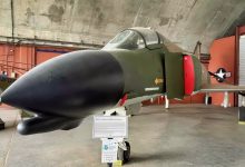 A Fully Loaded with Bombs US Air Force F-4 Phantom Fighter Rolled Upside Down Underneath a Tanker at Night in a Thunderstorm To Get Separation
