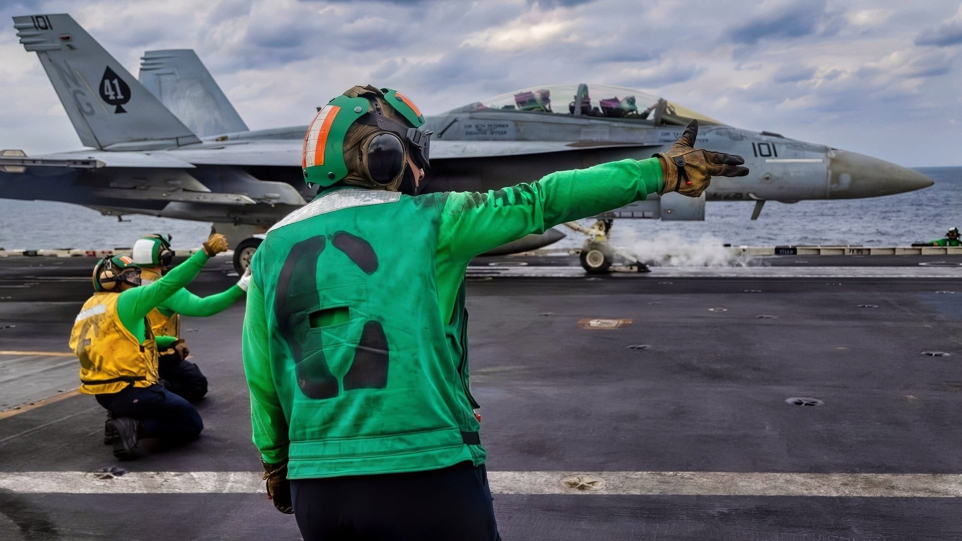 ARABIAN SEA (Jan. 28, 2026) An F/A-18F Super Hornet, attached to Strike Fighter Squadron (VFA) 41, prepares to launch from the flight deck of Nimitz-class aircraft carrier USS Abraham Lincoln (CVN 72) in the Arabian Sea, Jan. 28. Abraham Lincoln is deployed to the U.S. 5th Fleet area of operations to support maritime security and stability in the CENTCOM area of responsibility. (U.S. Navy photo by Mass Communication Specialist Seaman Zoe Simpson)