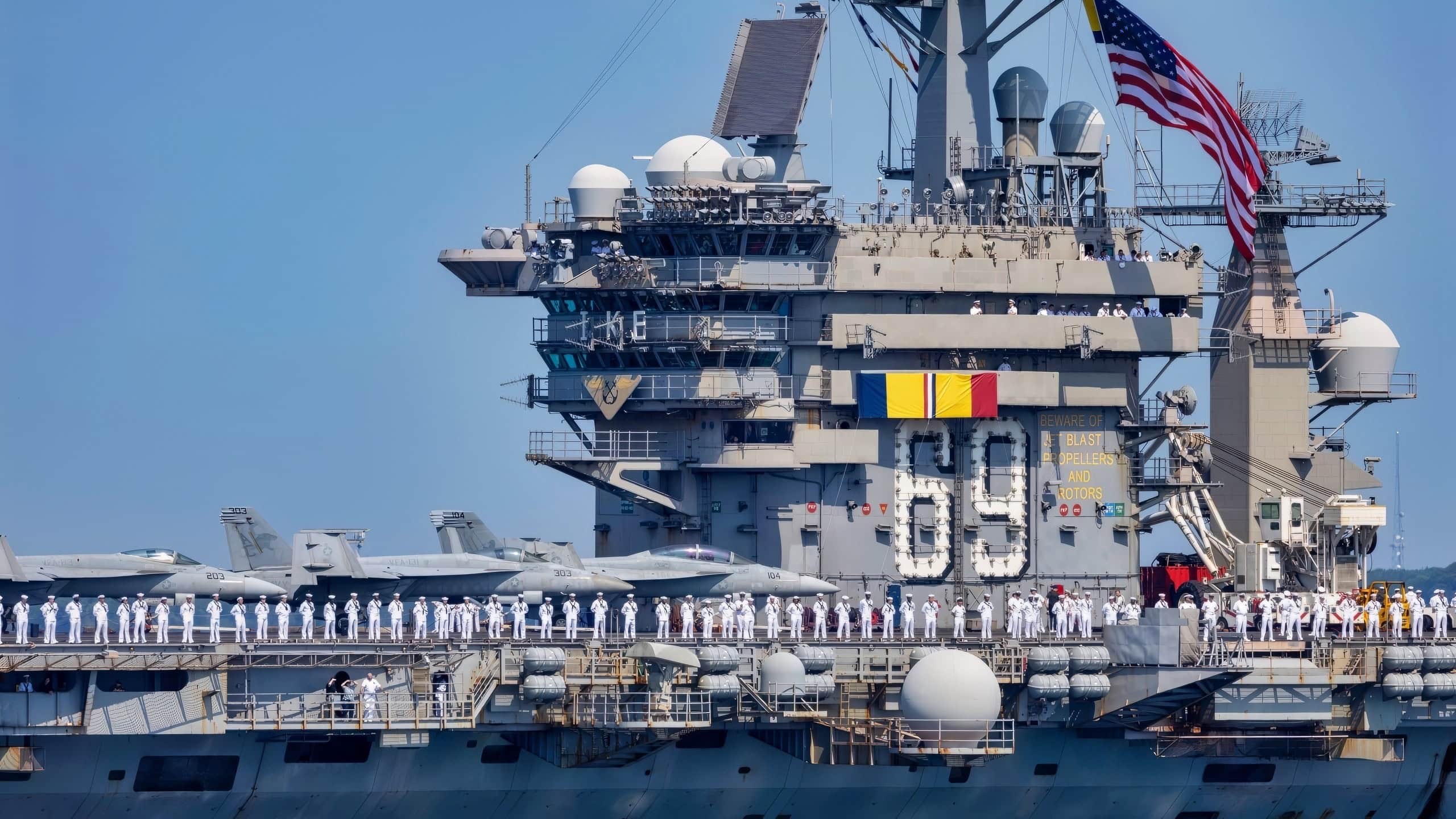 (July 14, 2024) The Nimitz-class aircraft carrier USS Dwight D. Eisenhower (CVN 69) returns to Naval Station Norfolk, July 14, 2024, concluding a nine-month deployment to the Atlantic. Eisenhower, the flagship of the Ike Carrier Strike Group, departed Norfolk October 14, 2023 to conduct a scheduled deployment to U.S. 5th and 6th Fleet area of operations in support of maritime security operations, theater security cooperation efforts, and enhanced vigilance activities operations with NATO Allies and Partners. (U.S. Navy Photo by Mass Communication Specialist 2nd Class Hunter Day)