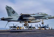 USS Abraham Lincoln is 305 days into a cruise that is now the second-longest U.S. aircraft carrier deployment since the Cold War and after Iran combat, 208 days straight at sea, and a one-day stop at Naval Base Guam the strike group is still weeks from San Diego
