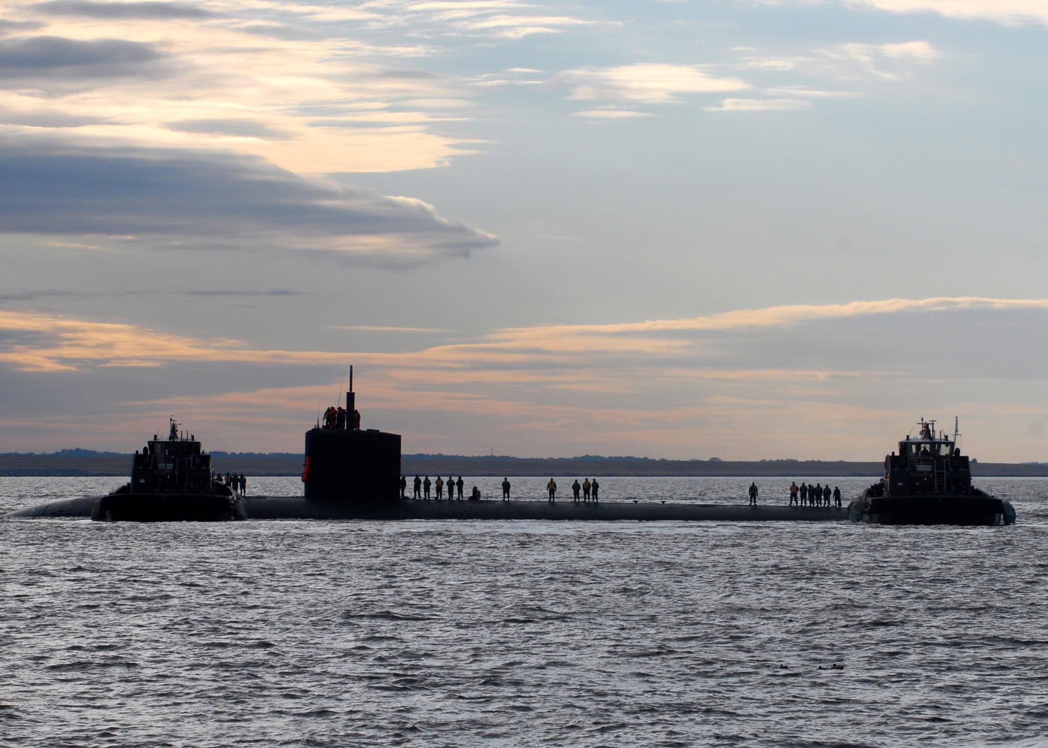 101222-N-7179M-058 NORFOLK (Dec. 21, 2010) The Los Angeles-class submarine USS Boise (SSN 764) returns to homeport at Naval Station Norfolk after a scheduled six-month deployment. Boise conducted operations in the U.S. European Command area of responsibility, supporting national security interests and maritime security operations. (U.S. Navy photo by Mass Communication Specialist 2nd Class Danna M. Morris/Released)
