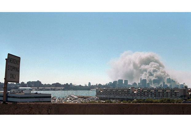 smoke-rises-ground-zero-911